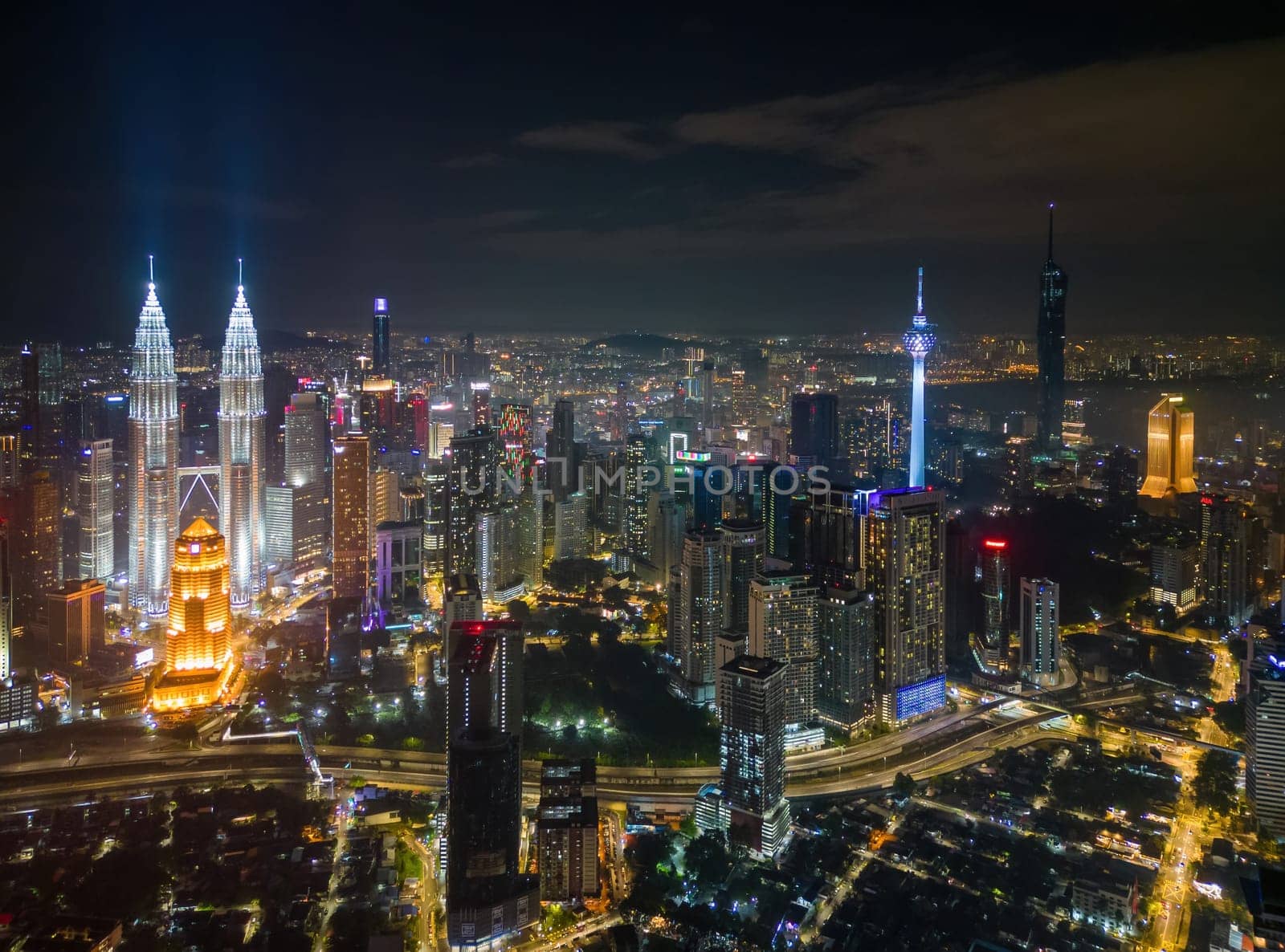 Bukit Bintang, Kuala Lumpur, Malaysia - Nov 29 2022: The city's nightlife of iconic four tall building in night