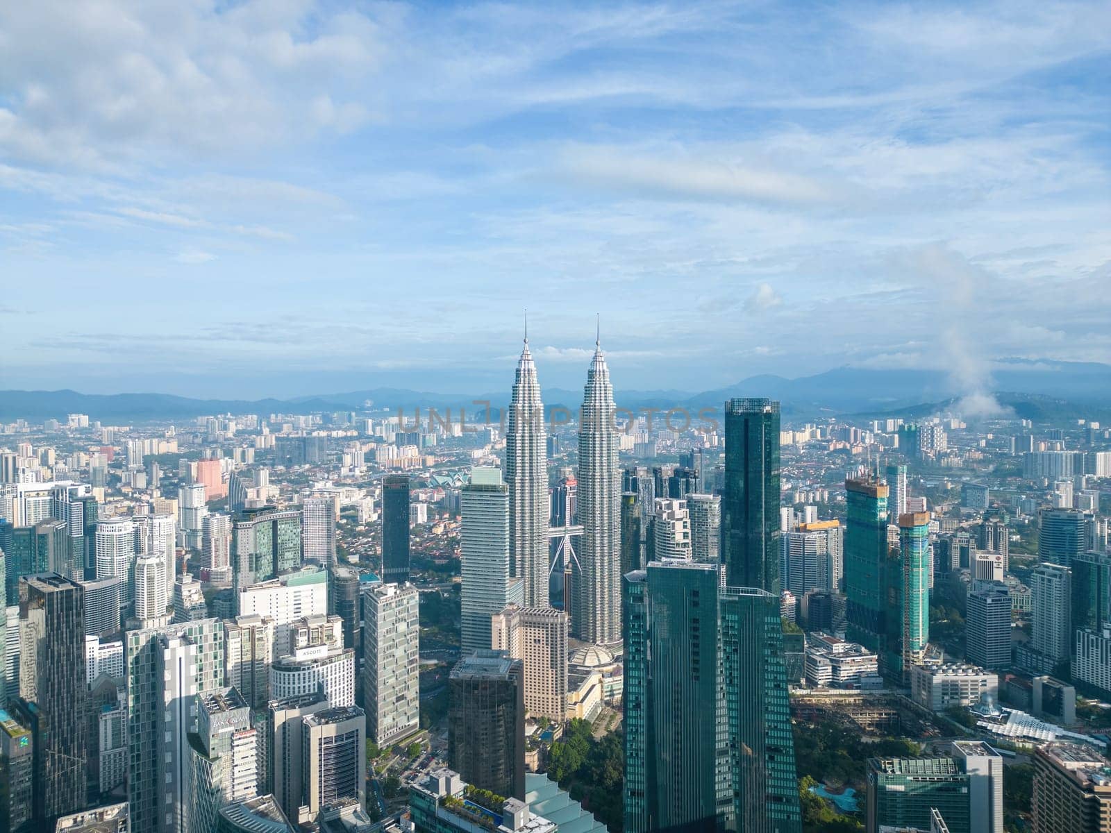 Bukit Bintang, Kuala Lumpur, Malaysia - Nov 30 2022: Aerial view of Kuala Lumpur KLCC Tower in the day reveals a city