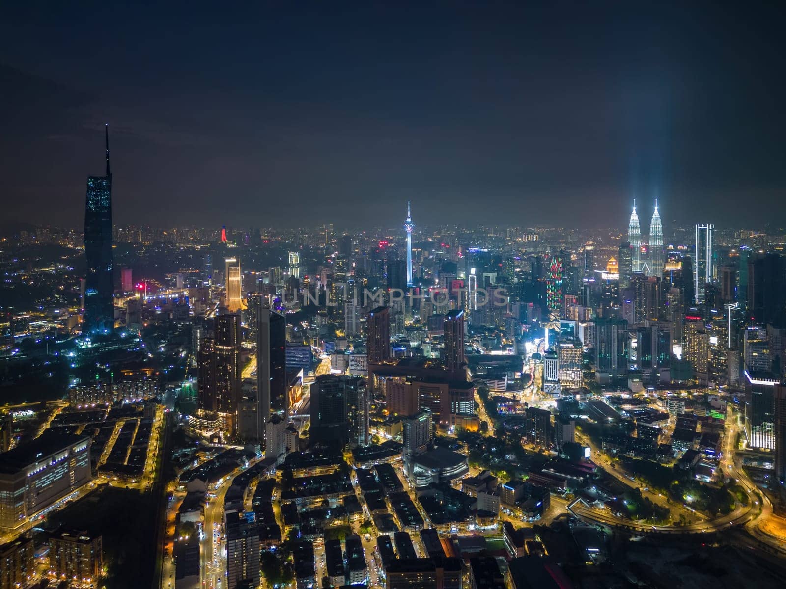 Bukit Bintang, Kuala Lumpur, Malaysia - Nov 28 2022: The skyline of KL is a stunning sight at night, with skyscrapers like the Menara KL Tower, PNB Merdeka 118 and KLCC lighting up the cityscape.