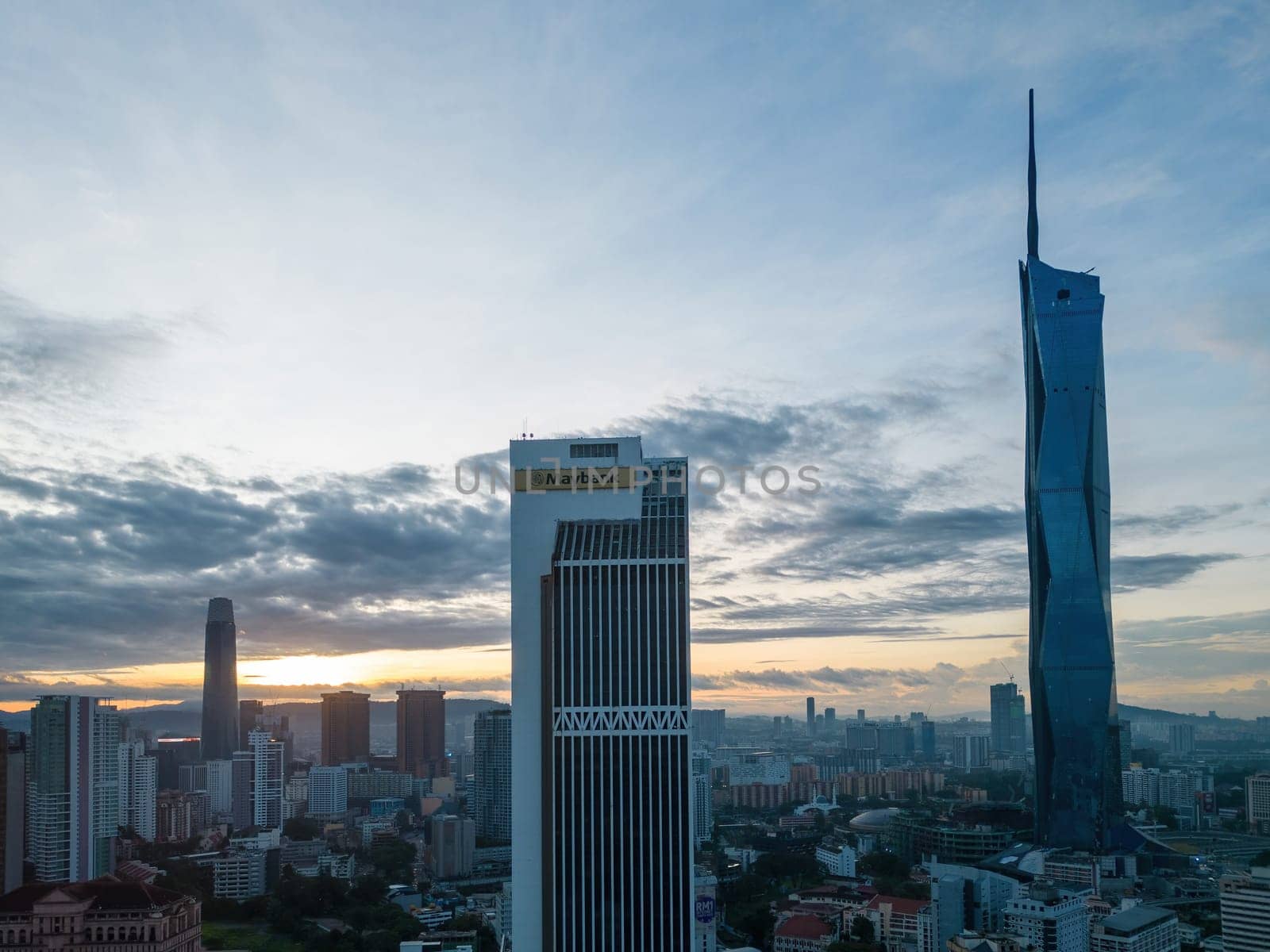 Bukit Bintang, Kuala Lumpur, Malaysia - Dec 05 2022: Aerial view Maybank Tower and other skyscraper in sunrise morning