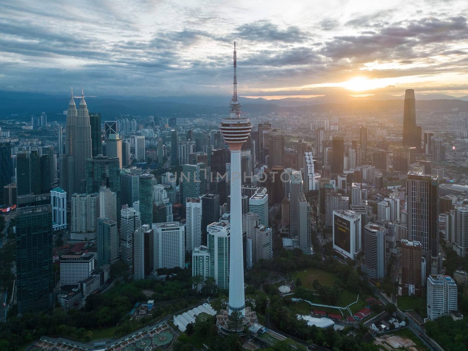 Bukit Bintang, Kuala Lumpur, Malaysia - Dec 05 2022: Kuala Lumpur Tower in morning, highlighting its expansive lake and tranquil surroundings.
