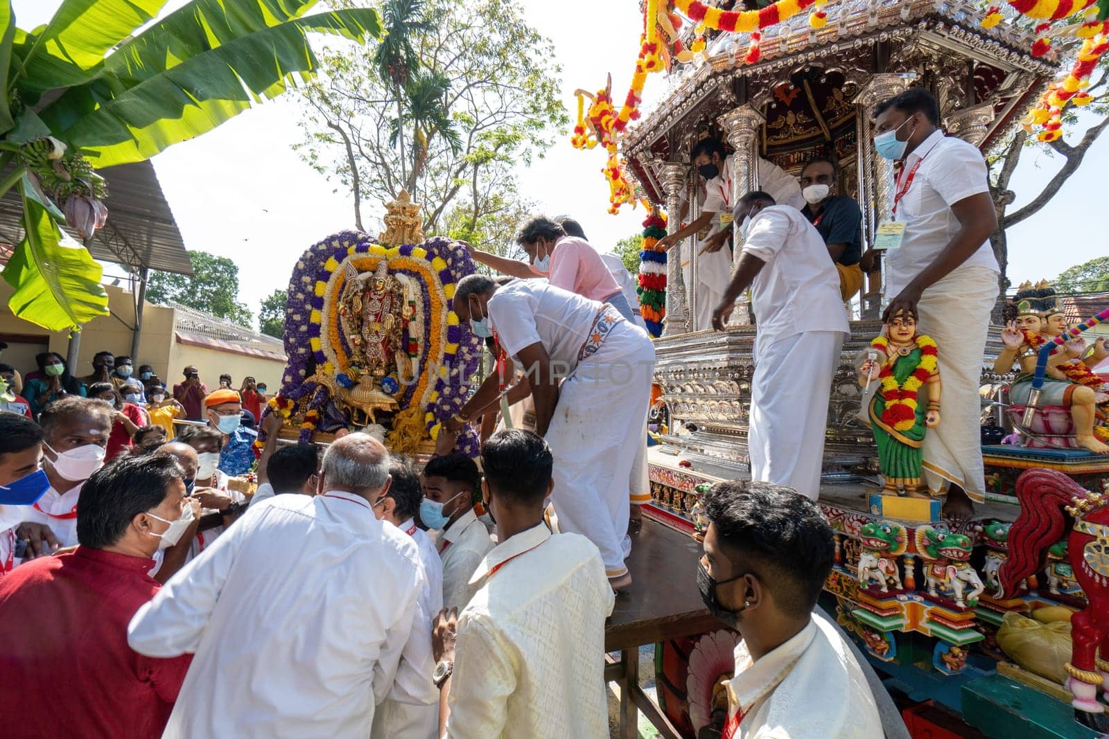 George Town, Penang, Malaysia - Jan 17 2022: Hindu volunteer move the Murugan statue from the silver chariot