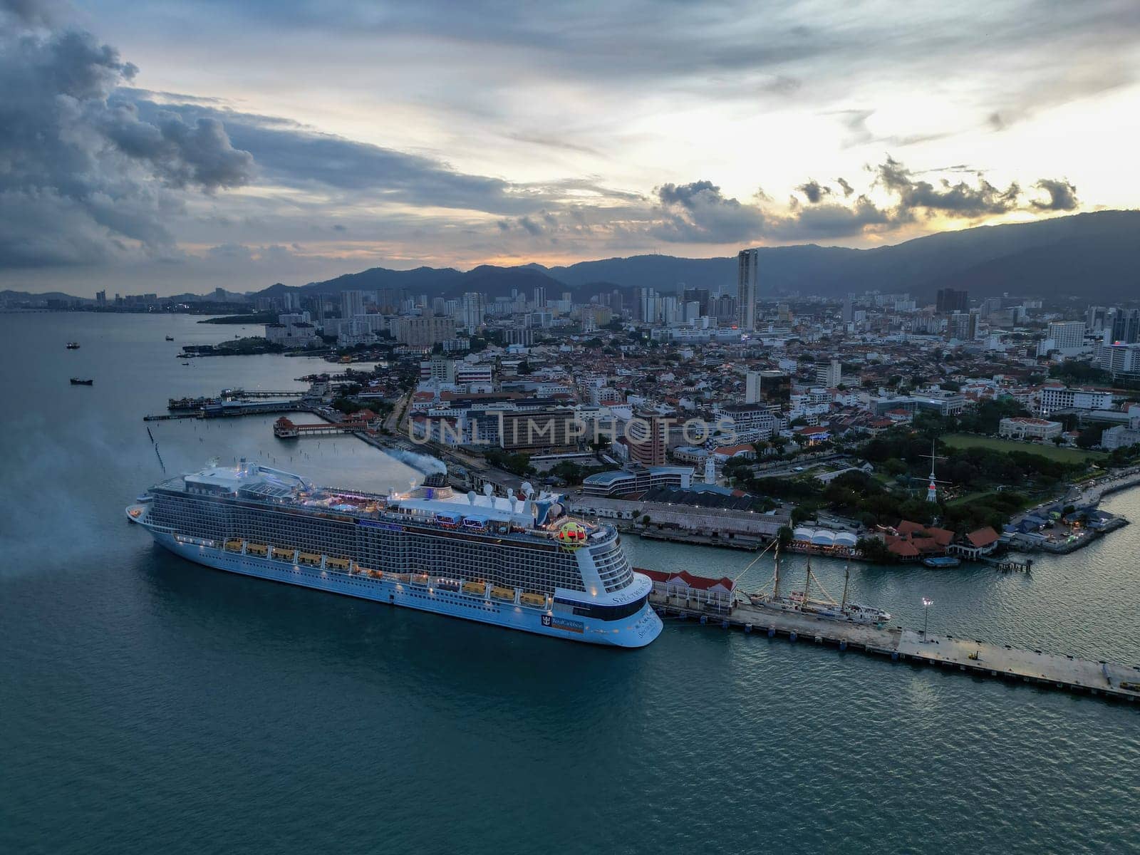 George Town, Penang, Malaysia - Nov 01 2022: Drone shot view Genting Dream cruise ship part at the Penang Port