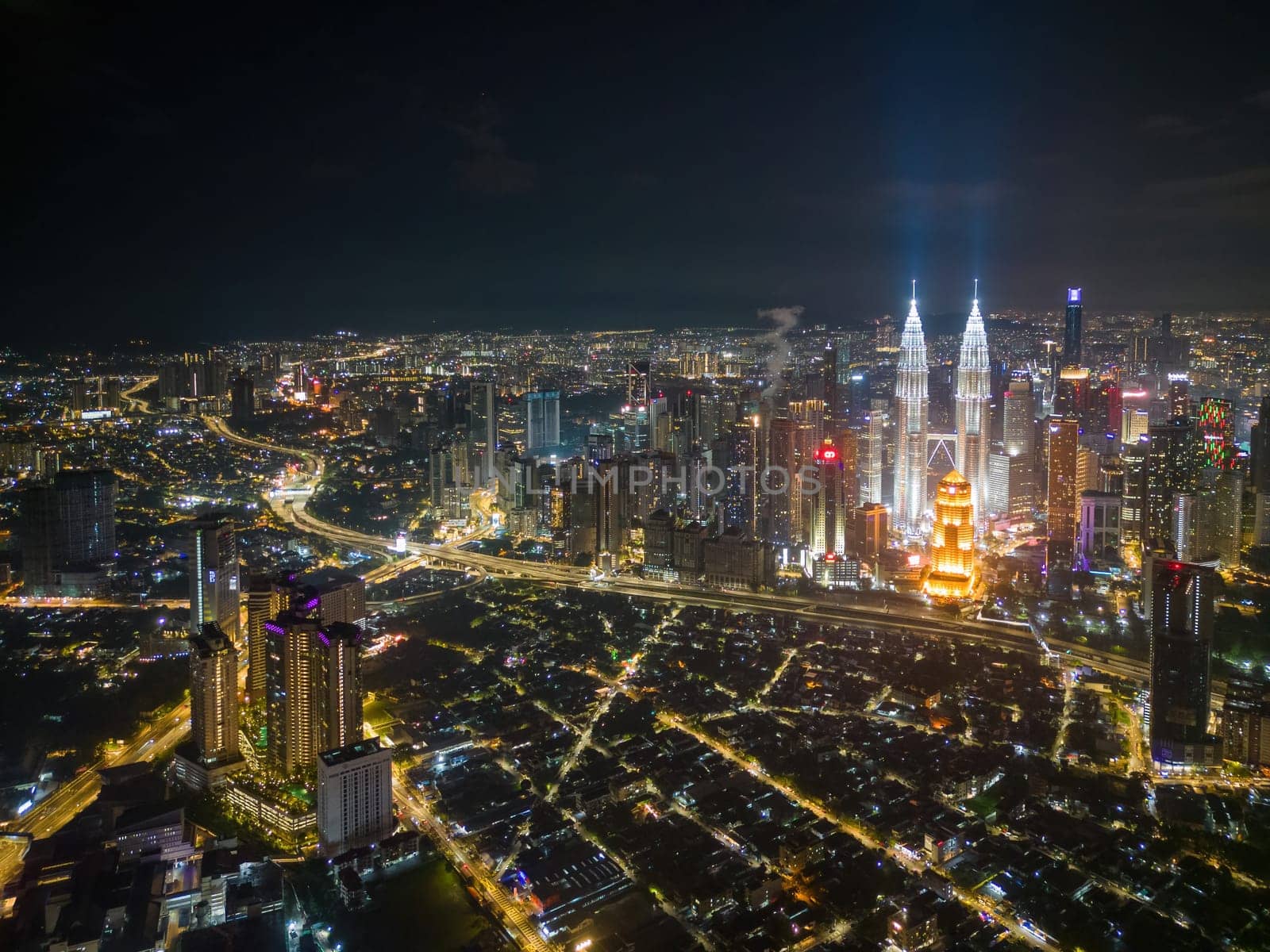 Bukit Bintang, Kuala Lumpur, Malaysia - Nov 29 2022: Aerial view of Kuala Lumpur town at night is a testament to the city's cosmopolitanism and modernity