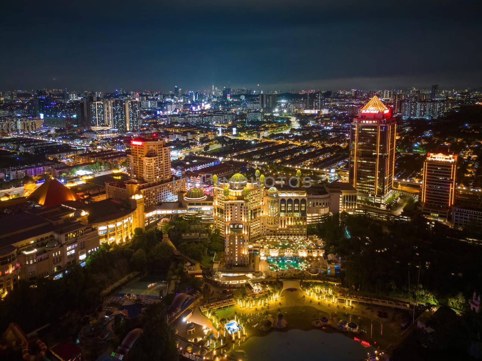 Sunway, Selangor, Malaysia - Nov 09 2022: Aerial view Sunway Pyramid, Sunway Lagoon, Sunway Resort in night
