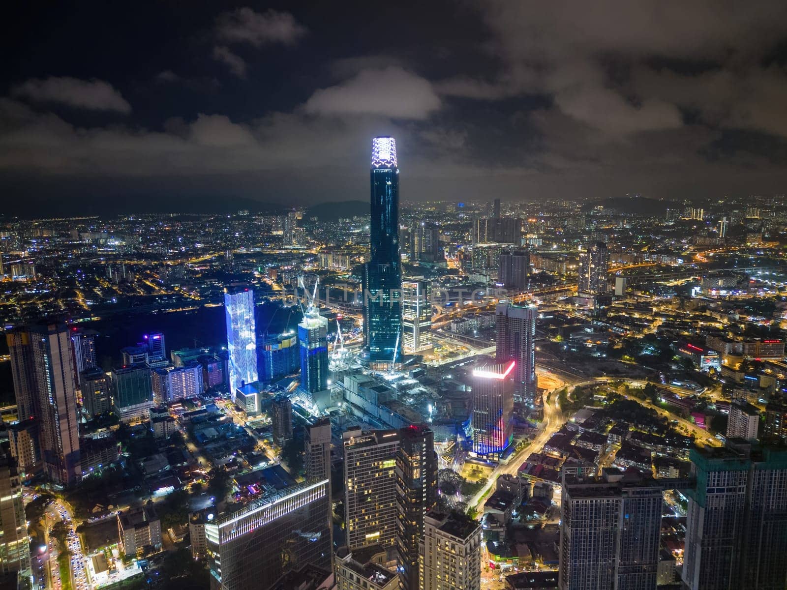 Bukit Bintang, Kuala Lumpur, Malaysia - Dec 03 2022: A stunning aerial shot of illuminated TRX Exchange 106 and other towering skyscrapers.