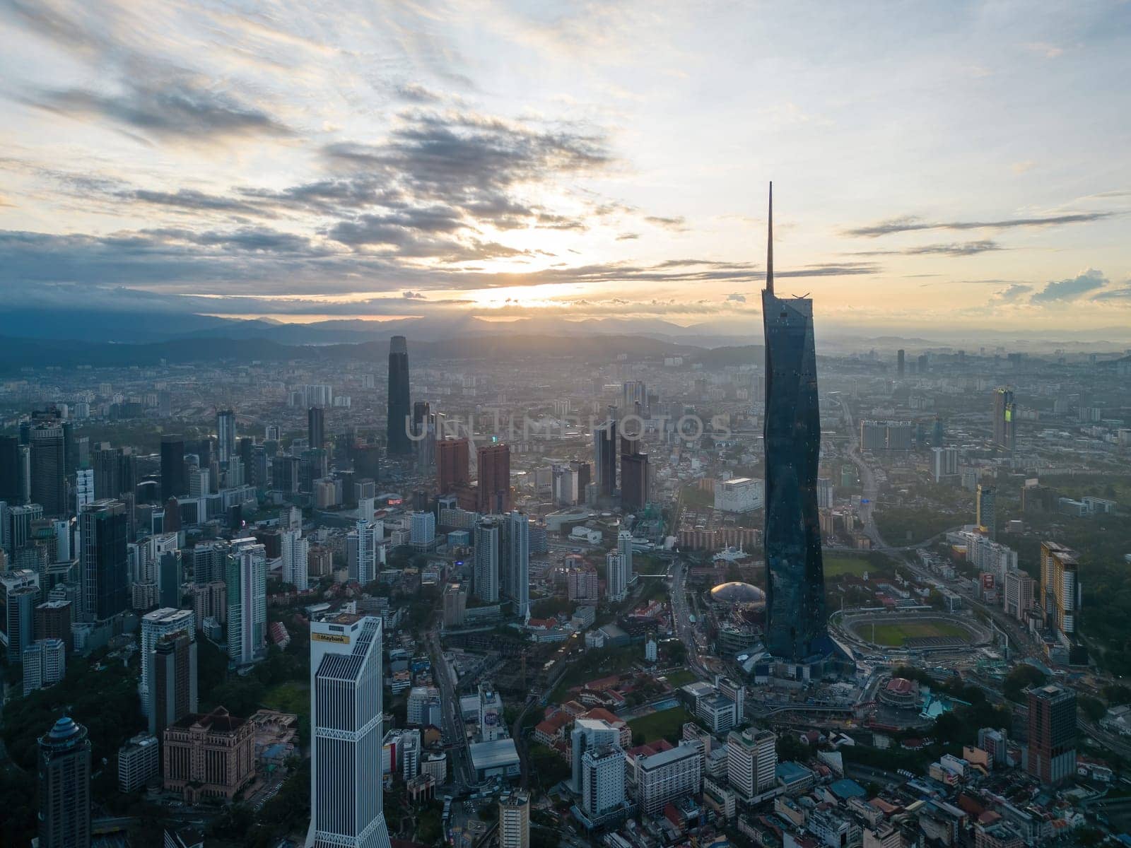 Bukit Bintang, Kuala Lumpur, Malaysia - Dec 05 2022: A bird's eye view of KL city Merdeka 118 tower and surround building with fast-paced urban lifestyle.