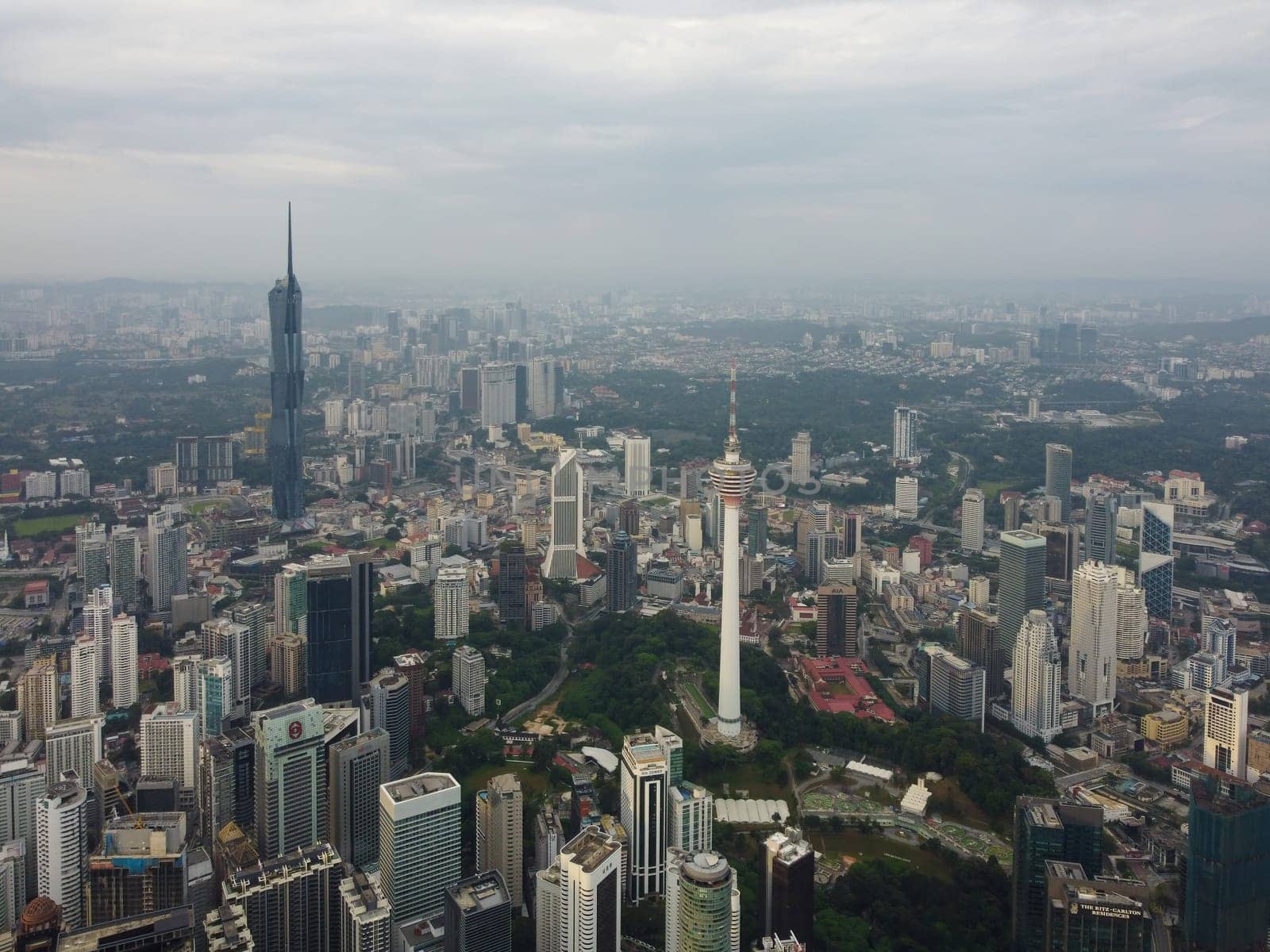 Bukit Bintang, Kuala Lumpur, Malaysia - Dec 25 2022: Aerial view of Kuala Lumpur town in the day is a testament to the city's energy, diversity, and modernity