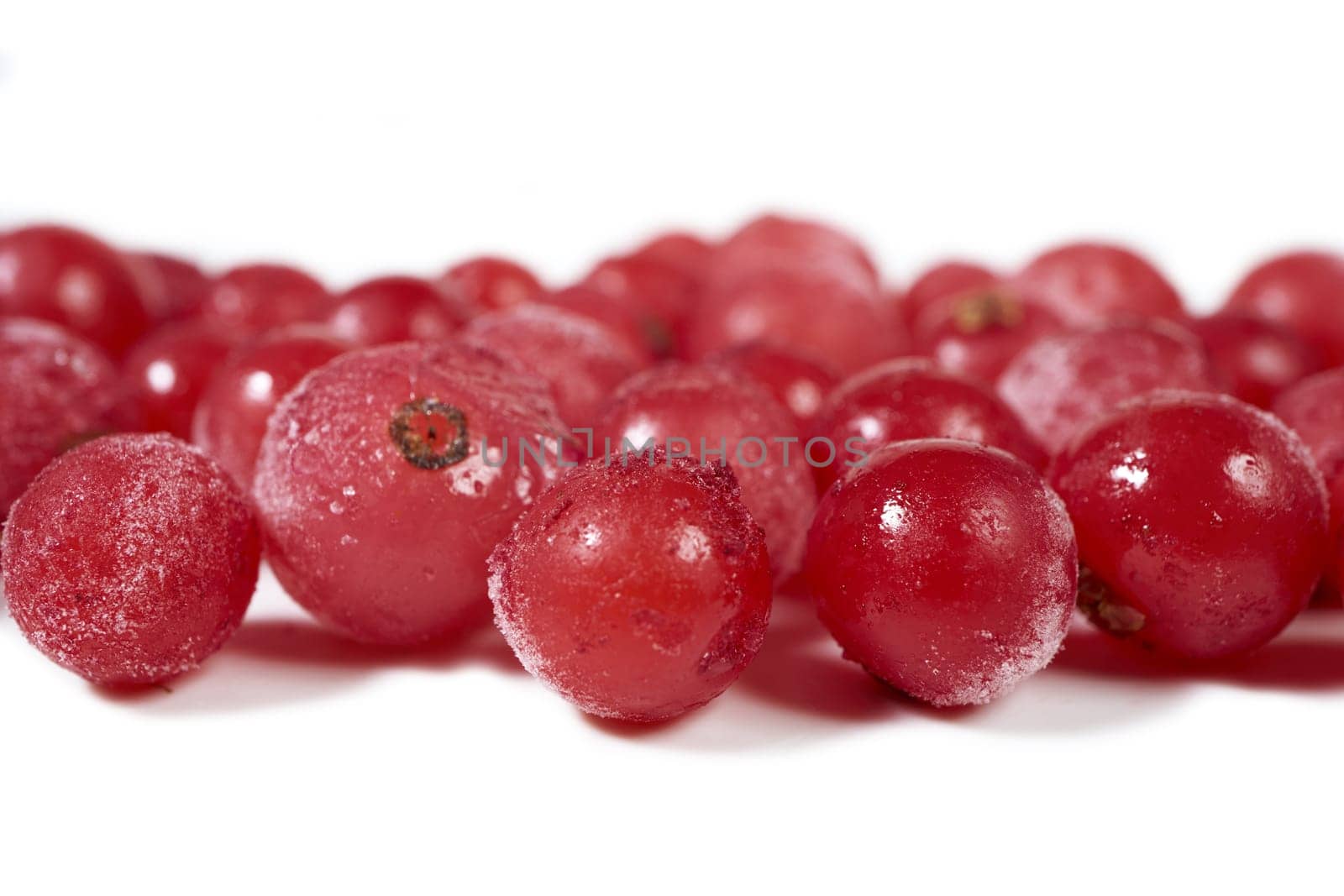 Frozen currants coated with ice crystals