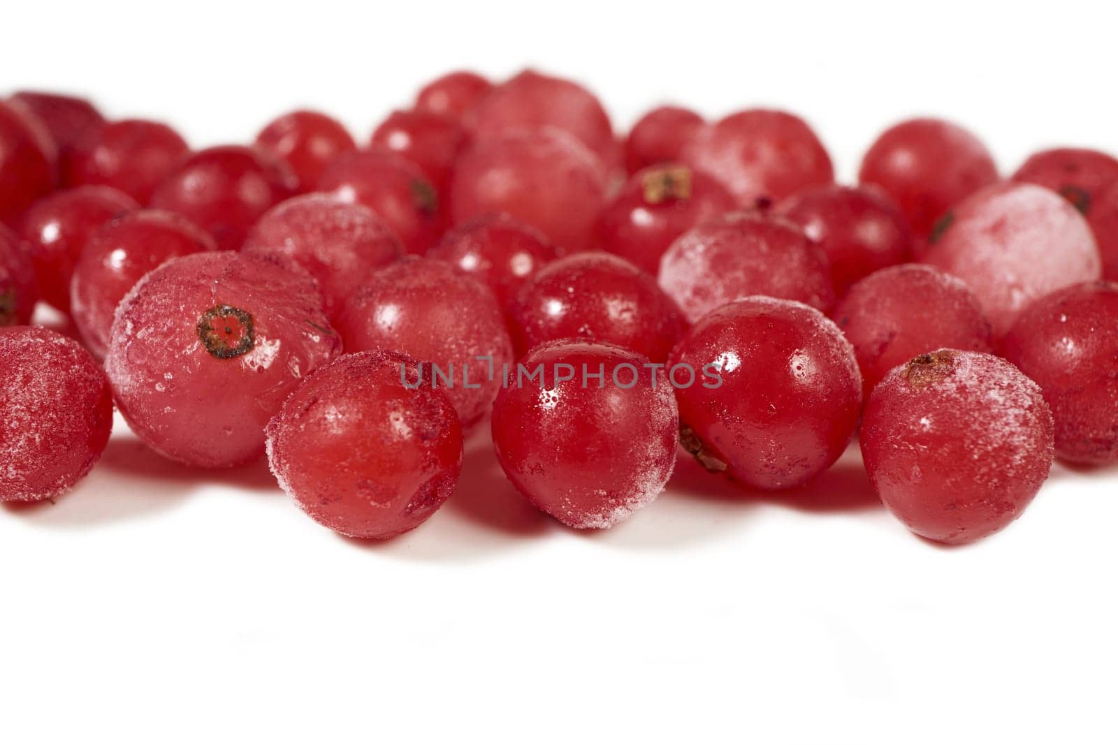 Frozen currants coated with ice crystals