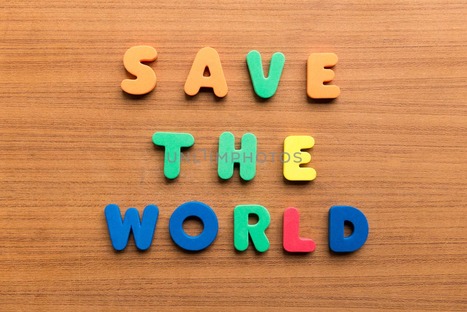 save the world colorful words on the wooden background