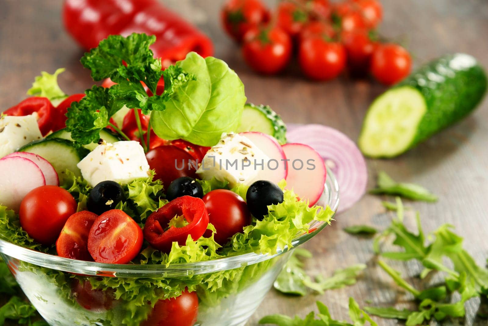 Vegetable salad bowl on kitchen table. Balanced diet.