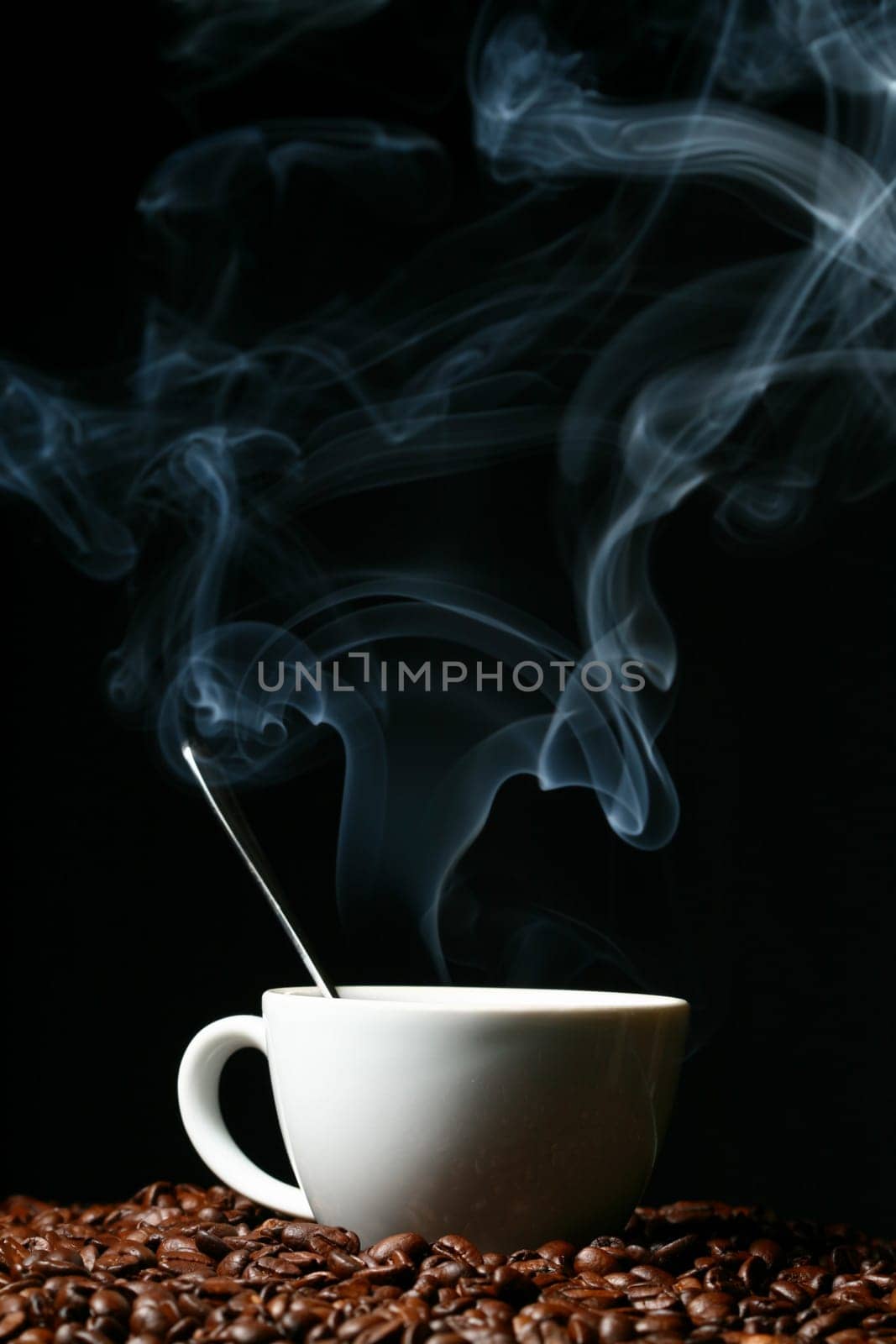 coffee beans and white hot cup of drink