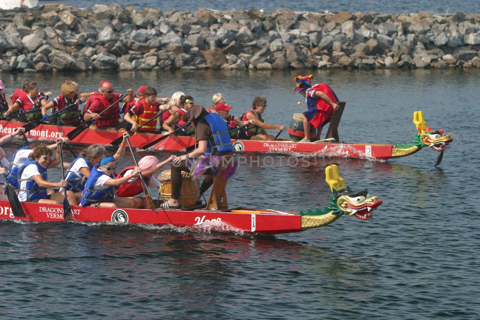 Dragon boat races on Lake Champlain in Burlington, Vermont, USA.  The races are held to raise money for breast cancer survivors.
