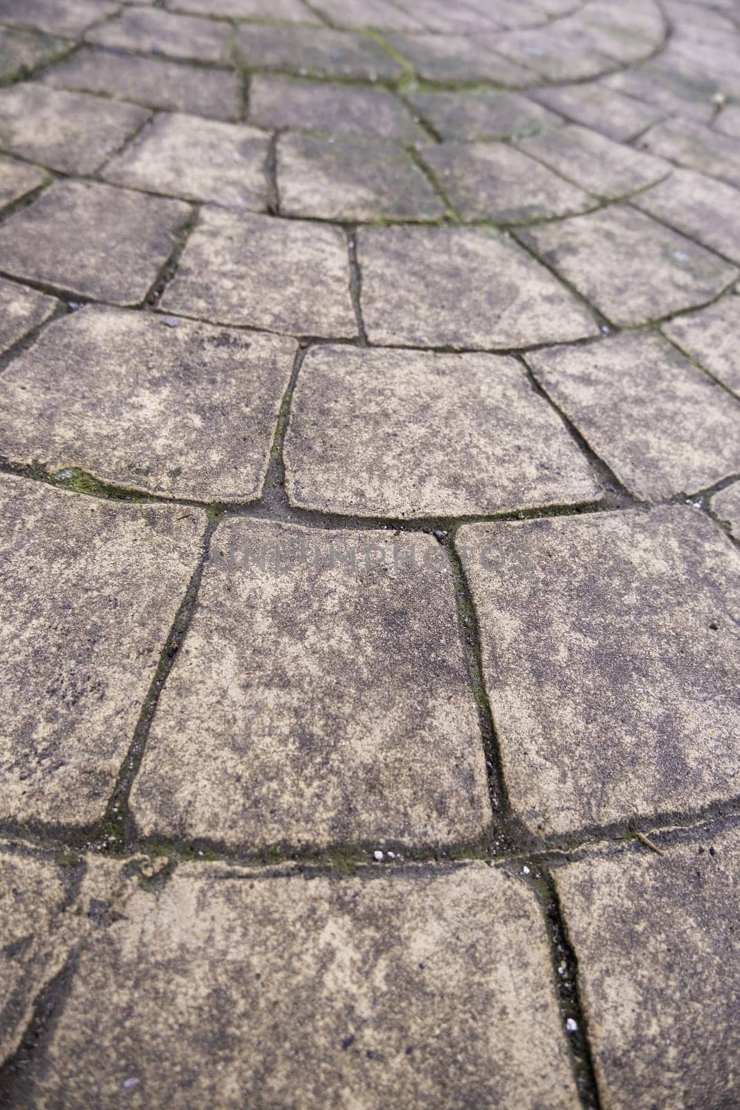 Detail of urban walkway floor decorated with cement