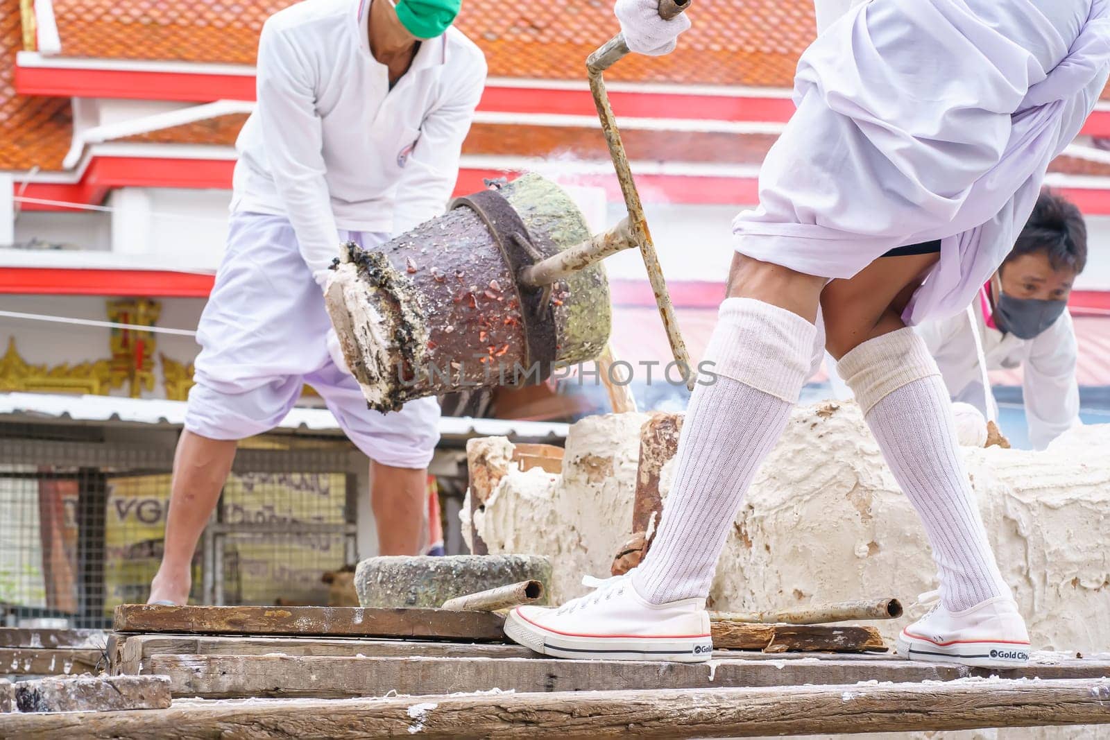 Nonthaburi, Thailand - AUG 17, 2019 - Pouring ceremony for Thonglor Buddha statues at Samian Nari Temple at Chatuchak, Bangkok, Thailand.
