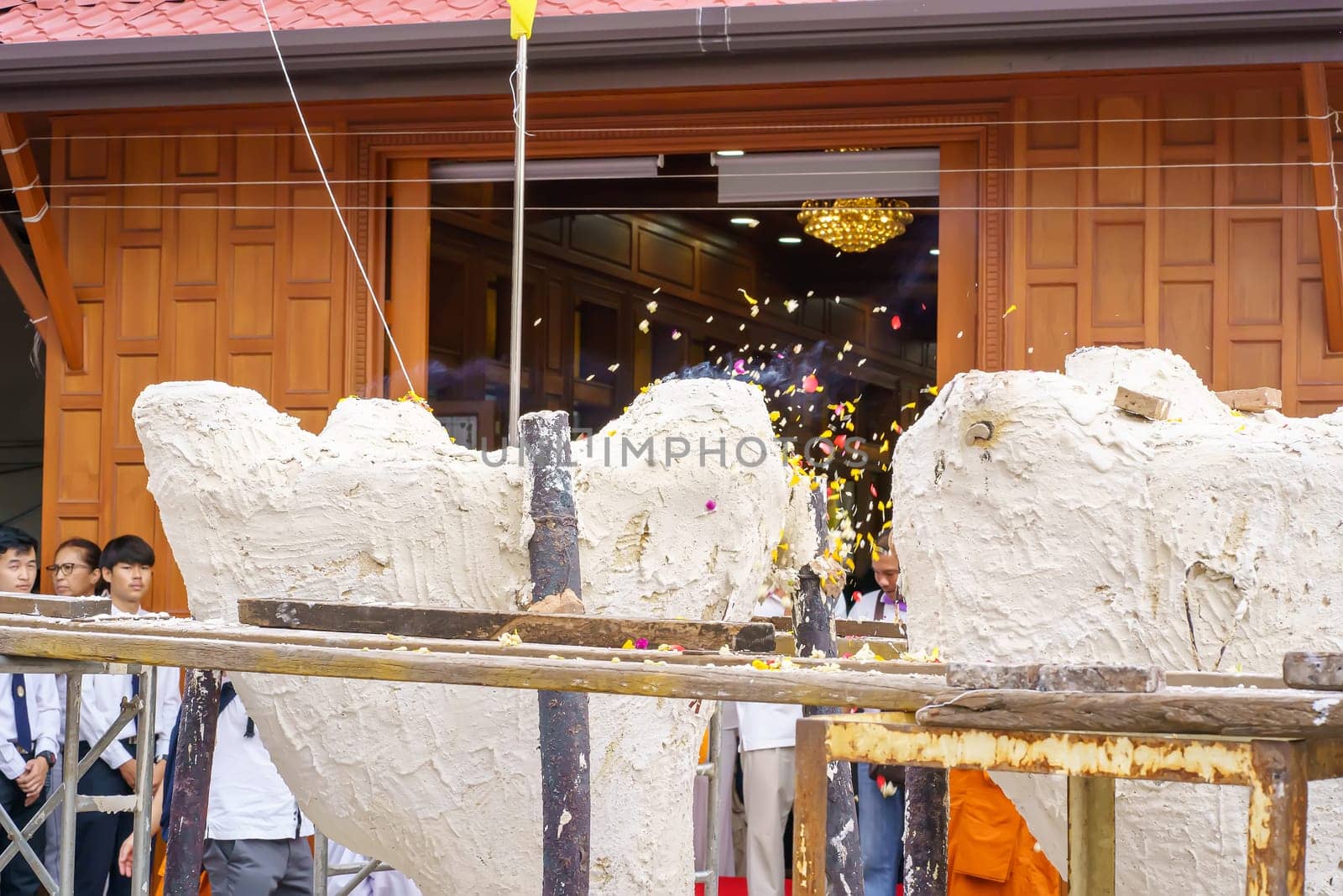 Nonthaburi, Thailand - AUG 17, 2019 - Pouring ceremony for Thonglor Buddha statues at Samian Nari Temple at Chatuchak, Bangkok, Thailand.