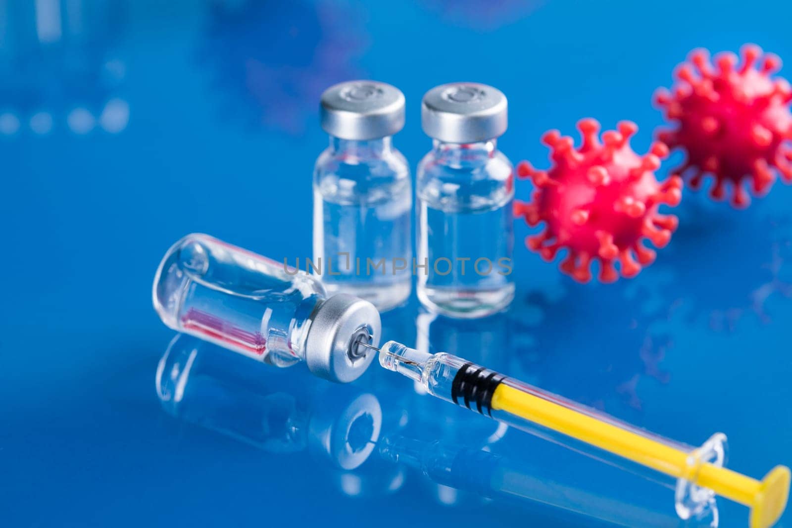 Close up medical syringe with a vaccine