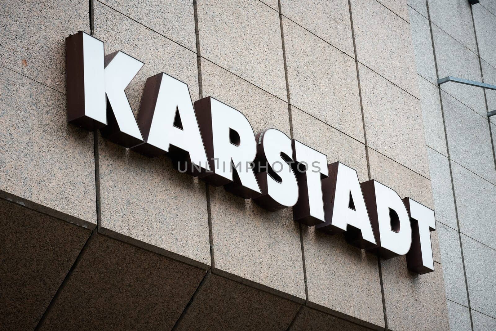 Lettering and neon sign of the department store group Karstadt at a branch in Goslar in Germany