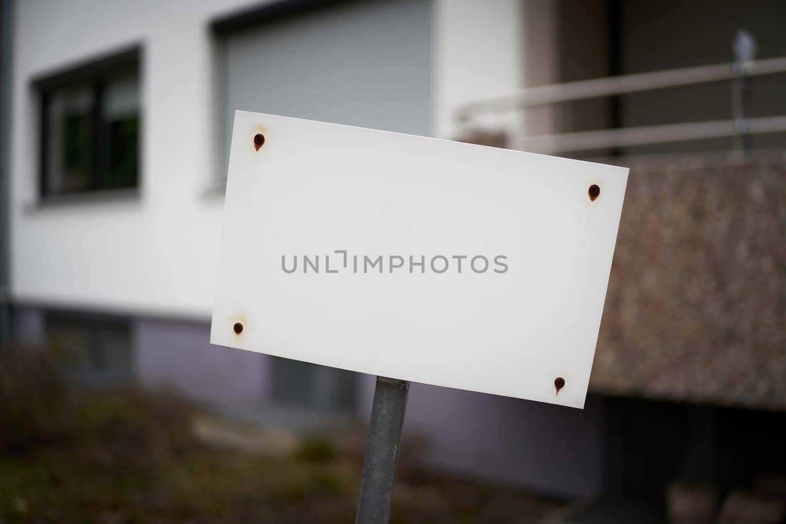 blank white unlabeled sign with text space