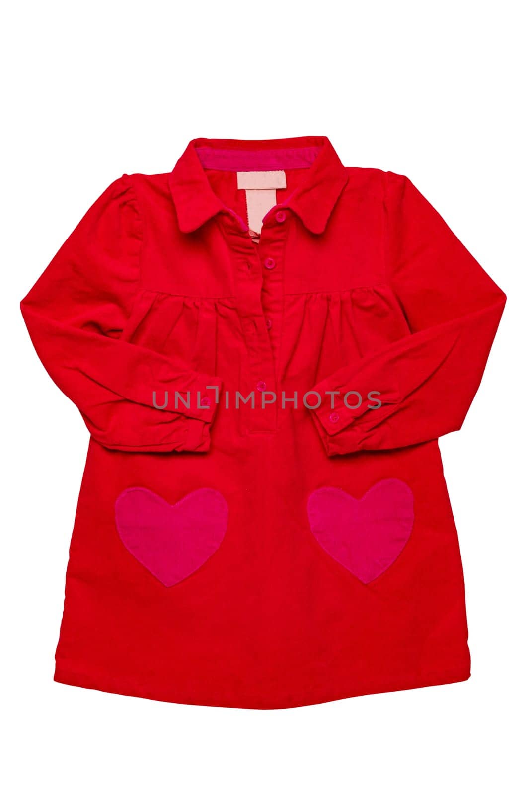 Summer dress isolated. A beautiful red girl's dress with attached heart shaped pockets and long sleeves isolated on white. Kids spring and autumn fashion.