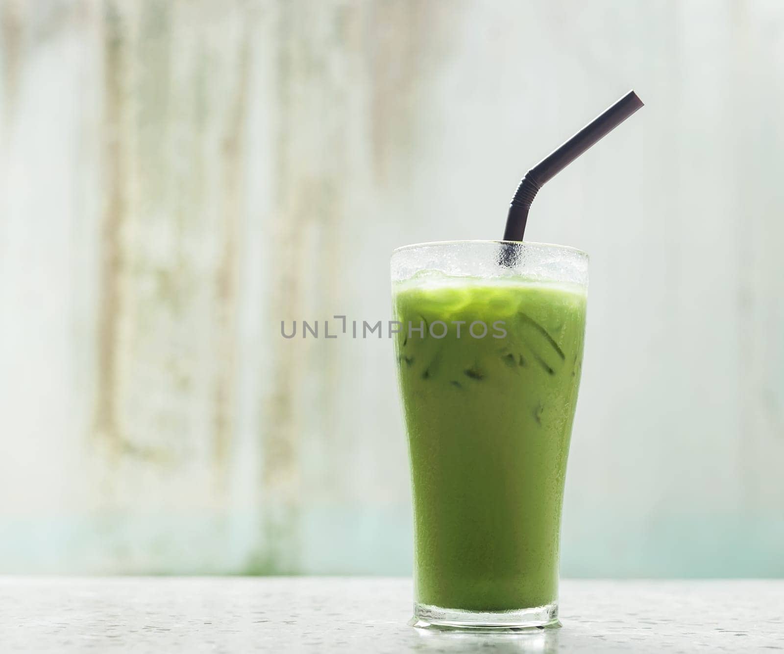 Ice milk green tea, famous drink in Thailand, Grunge background