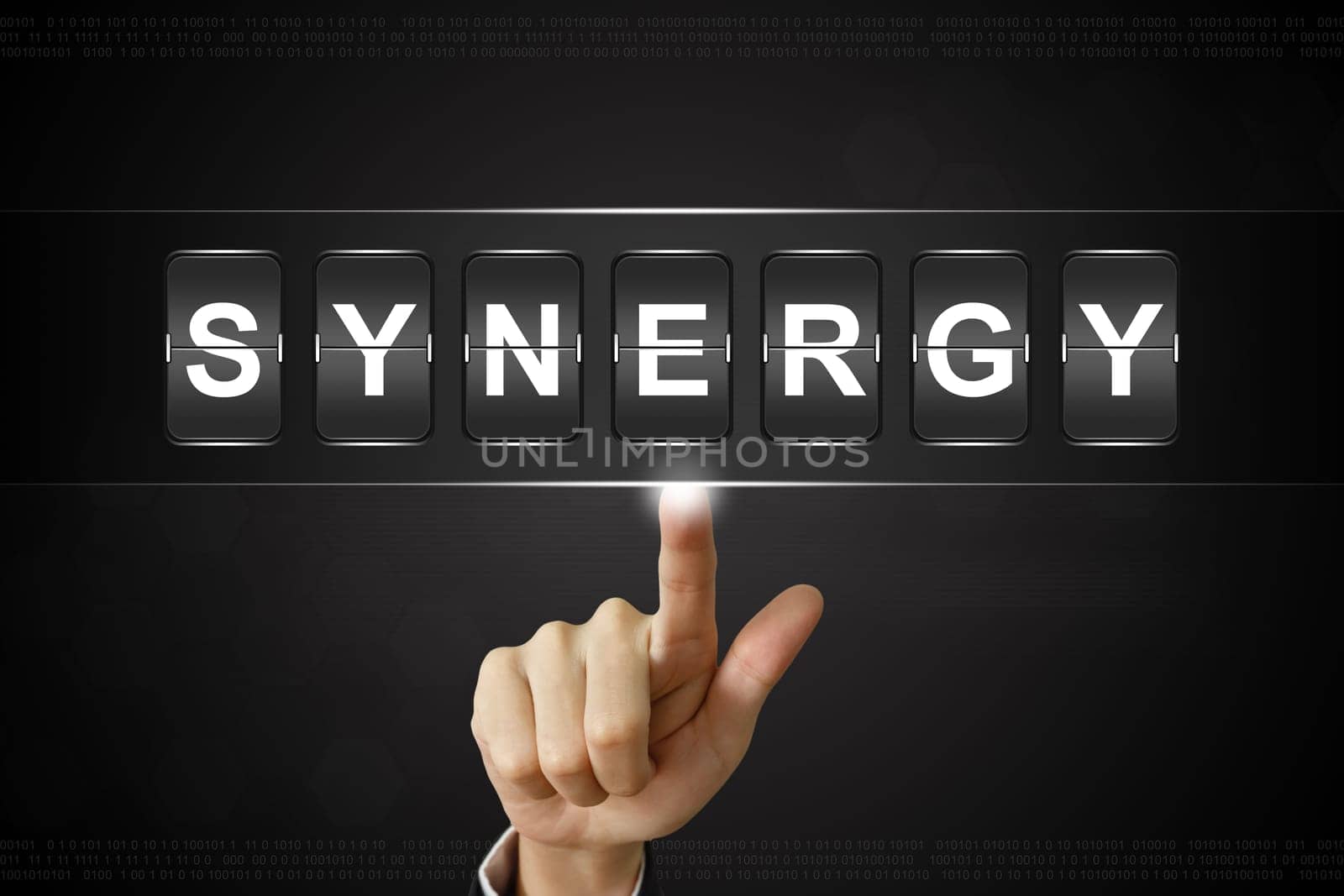 business hand pushing synergy on Flipboard Display