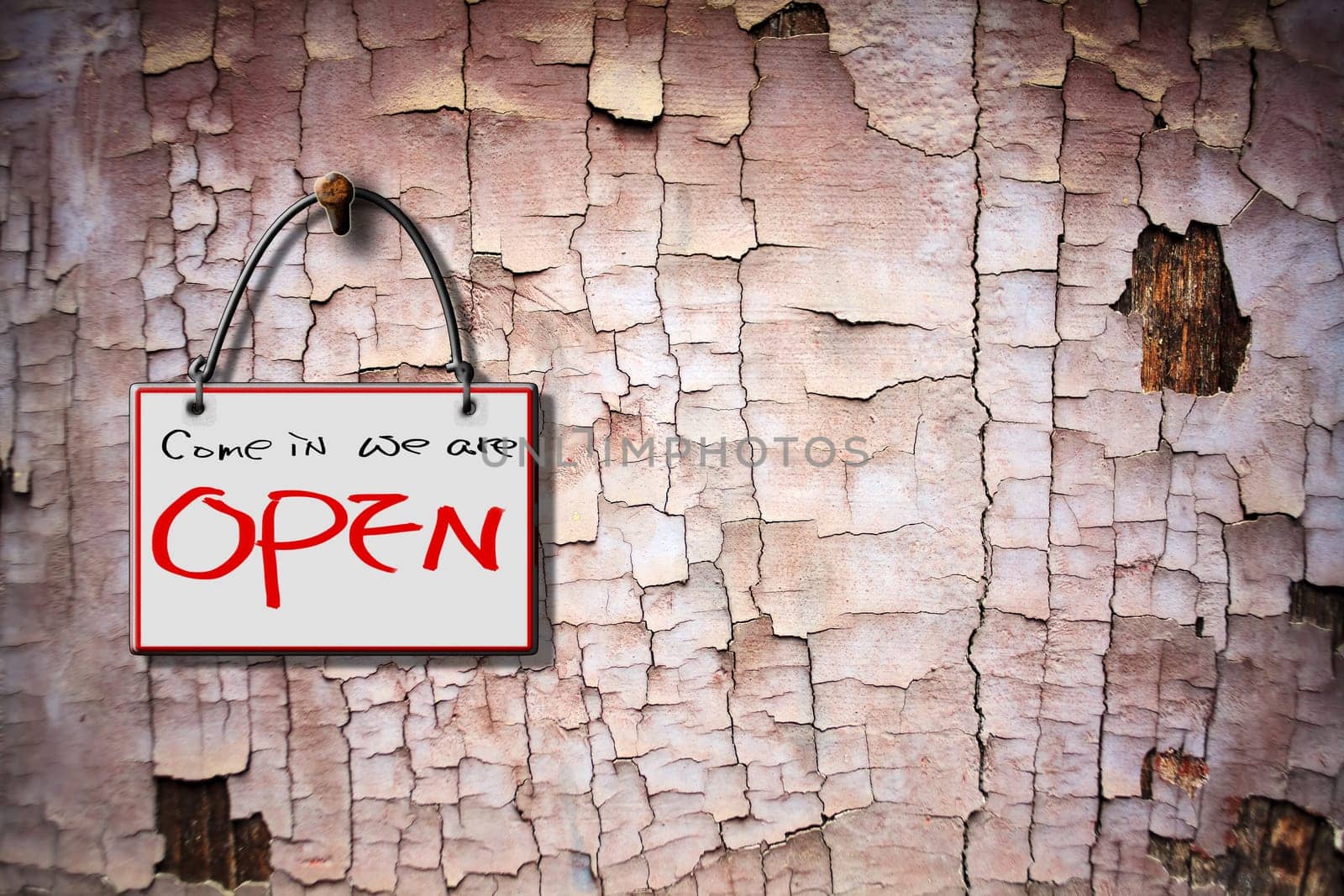 come in we are open hanging sign isolated on wall for adv or others purpose use