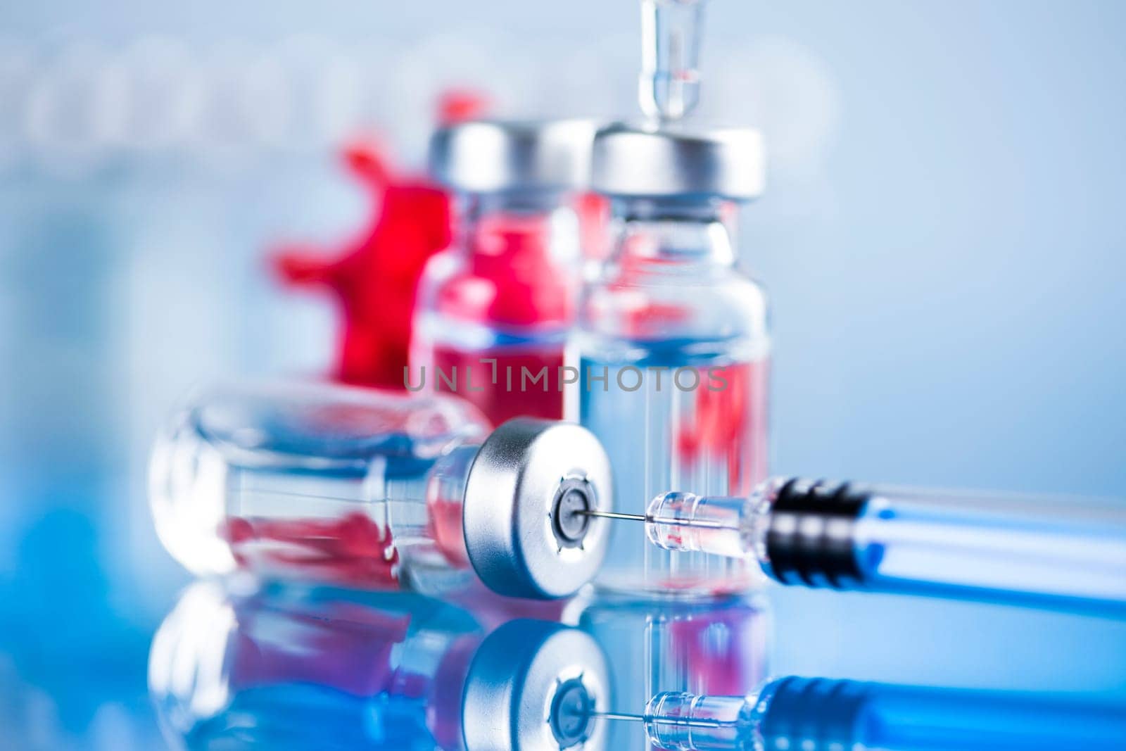 Close up medical syringe with a vaccine