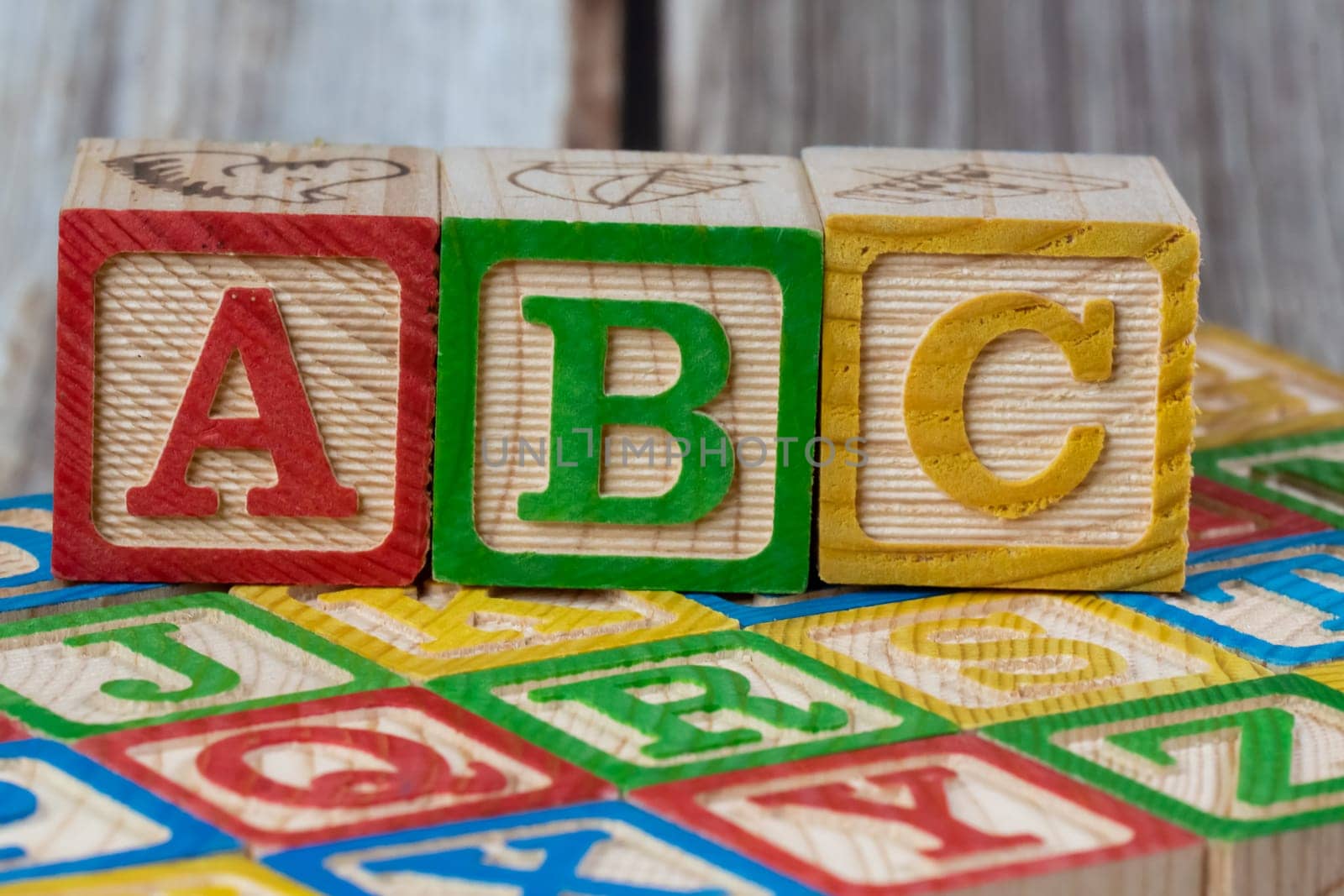 ABC education wood block stack together