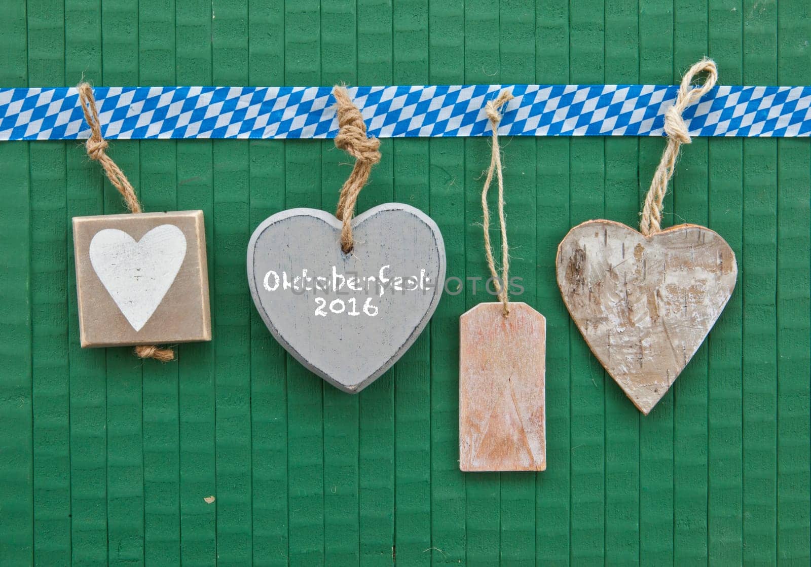 Small plates of your heart on grueouts with blue and white gift ribbon