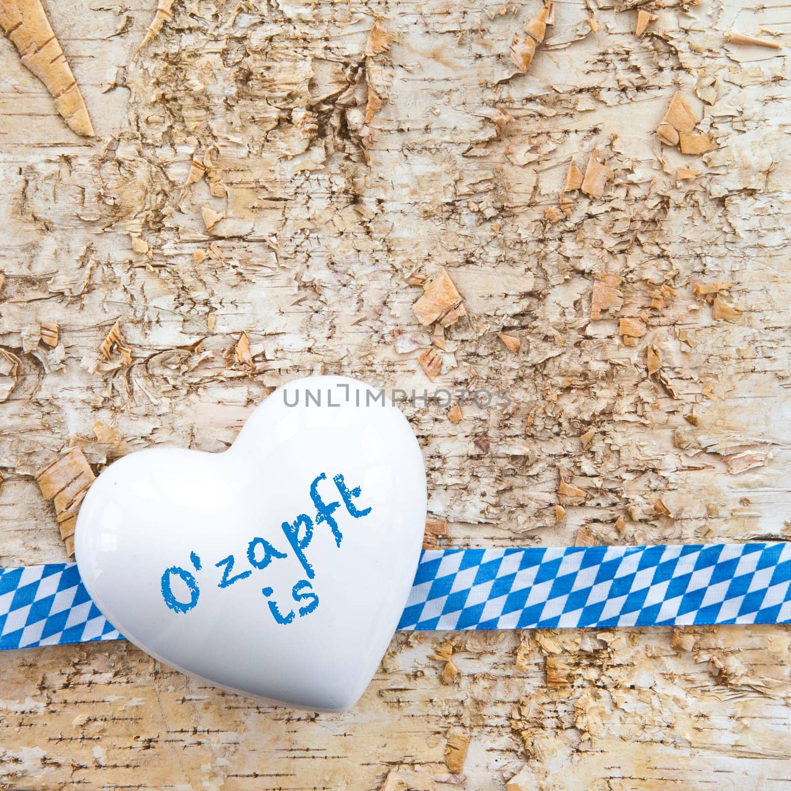 Rustic background made of birch bark with heart