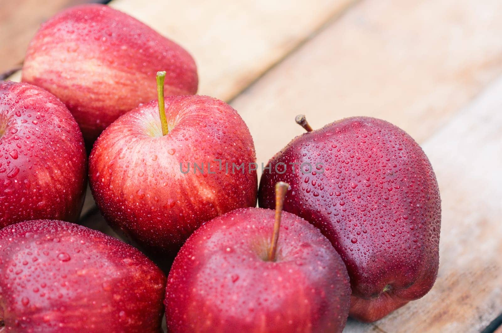 close up apple fresh on wood grain