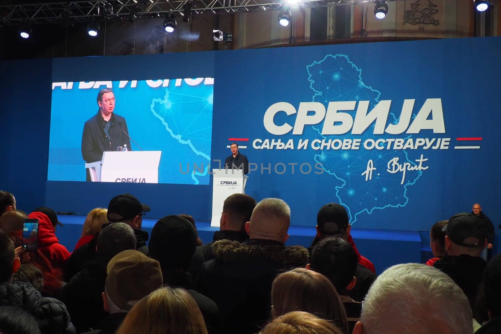 Sremska Mitrovica Serbia 03.17.2023 Rally of the Serbian Progressive Party SNS. President of the Republic of Serbia Aleksandar Vucic speaks to the electorate. Text - Serbia dreams and fulfills dreams