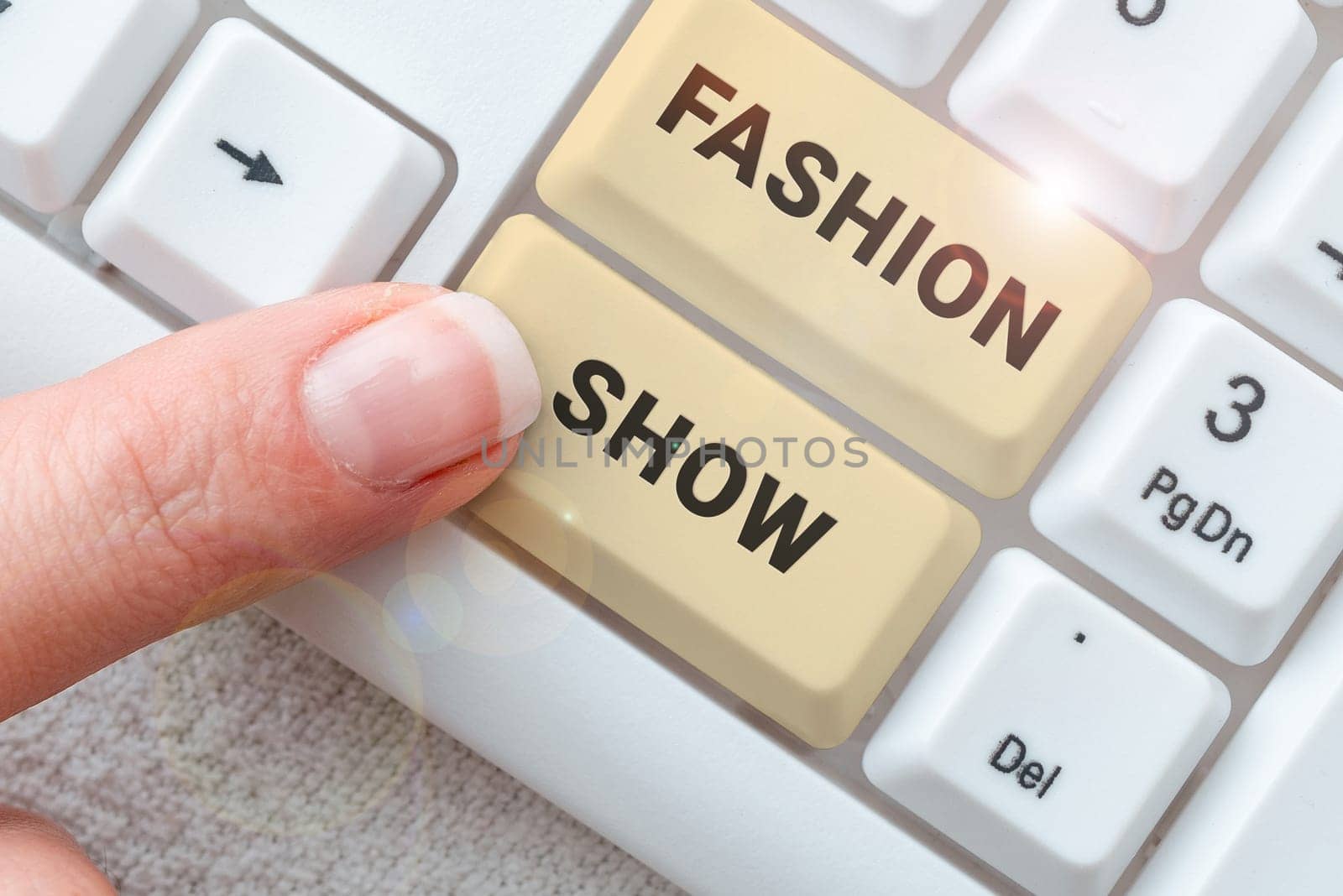 Sign displaying Fashion Show, Internet Concept exibition that involves styles of clothing and appearance