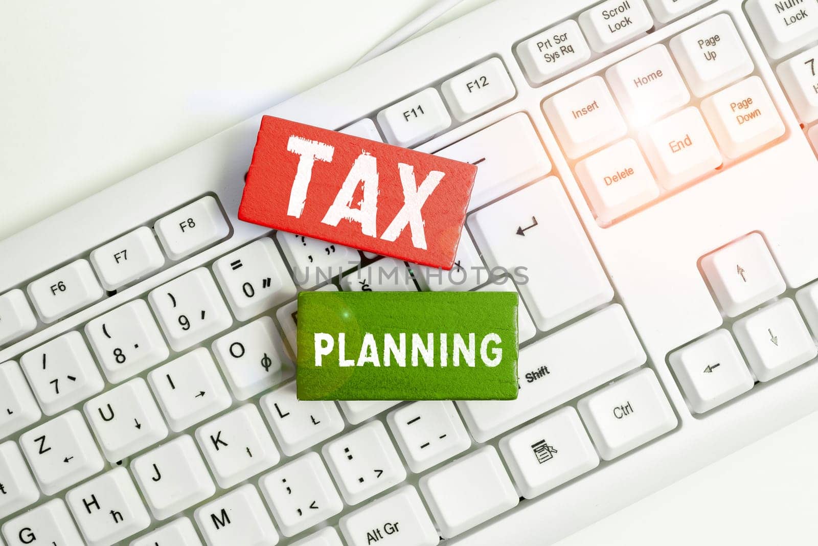 Hand writing sign Tax Planning, Business idea analysis of financial situation or plan from a tax perspective