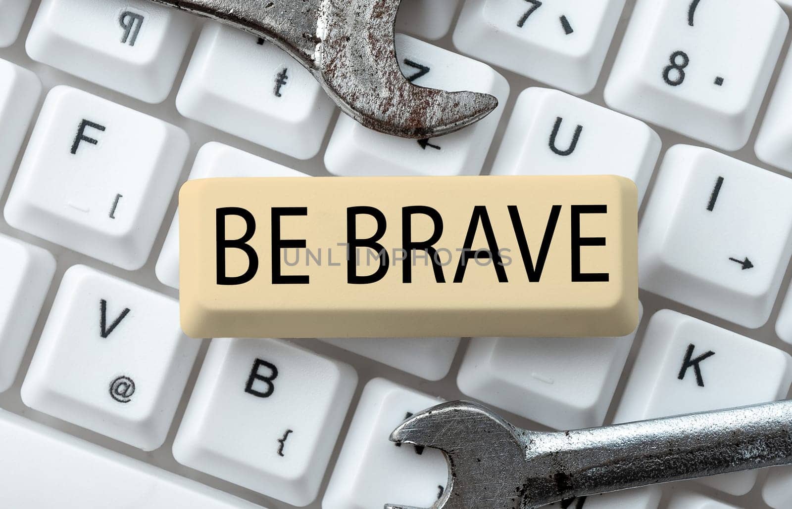 Hand writing sign Be Brave, Word Written on ready to face and endure danger or pain showing courage Bold
