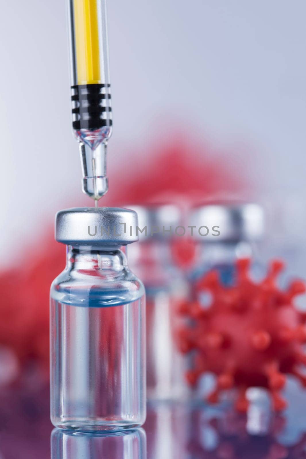 Close up medical syringe with a vaccine