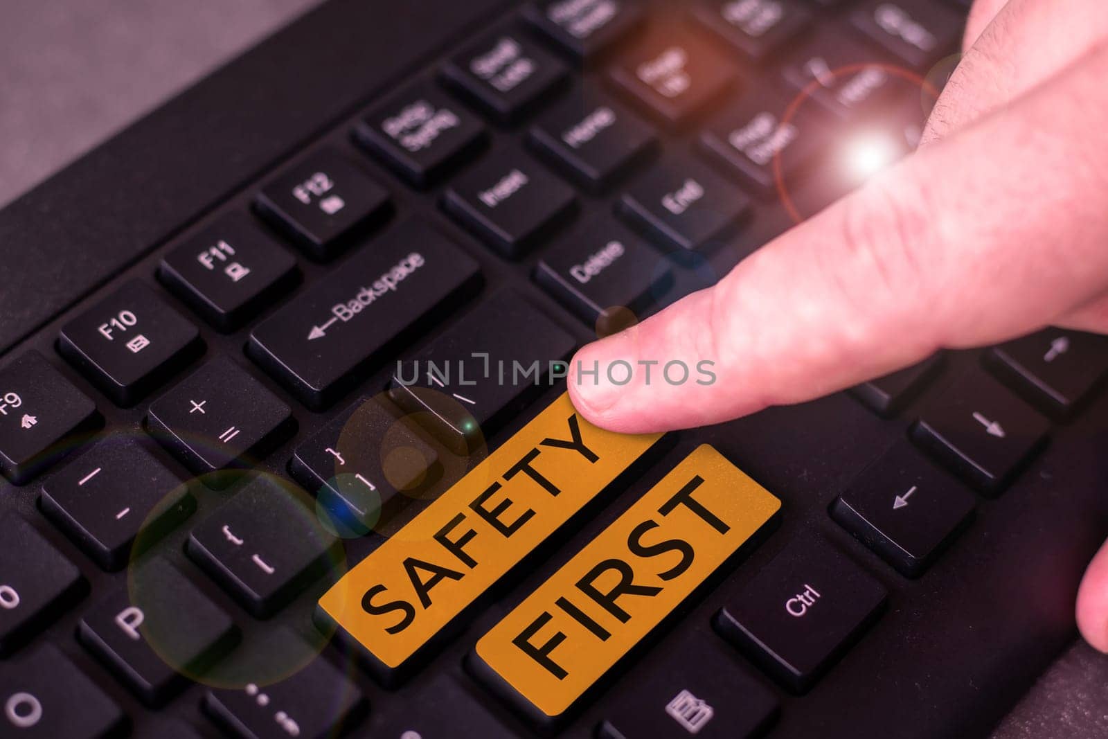 Hand writing sign Safety First, Word Written on Avoid any unnecessary risk Live Safely Be Careful Pay attention