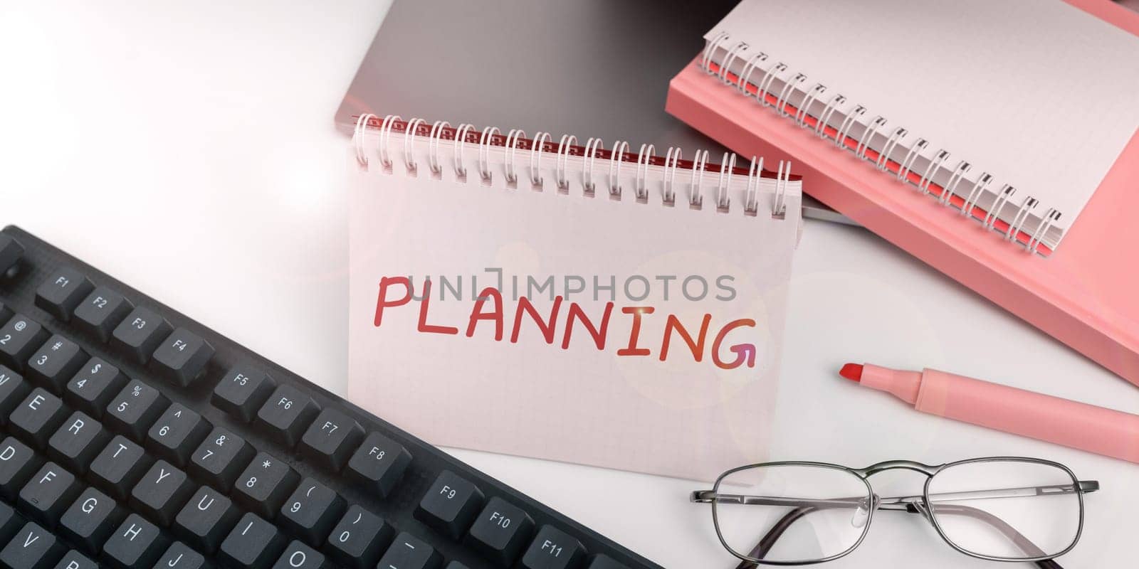 Writing displaying text Planning, Business overview process of thinking about the activities required to achieve a goal