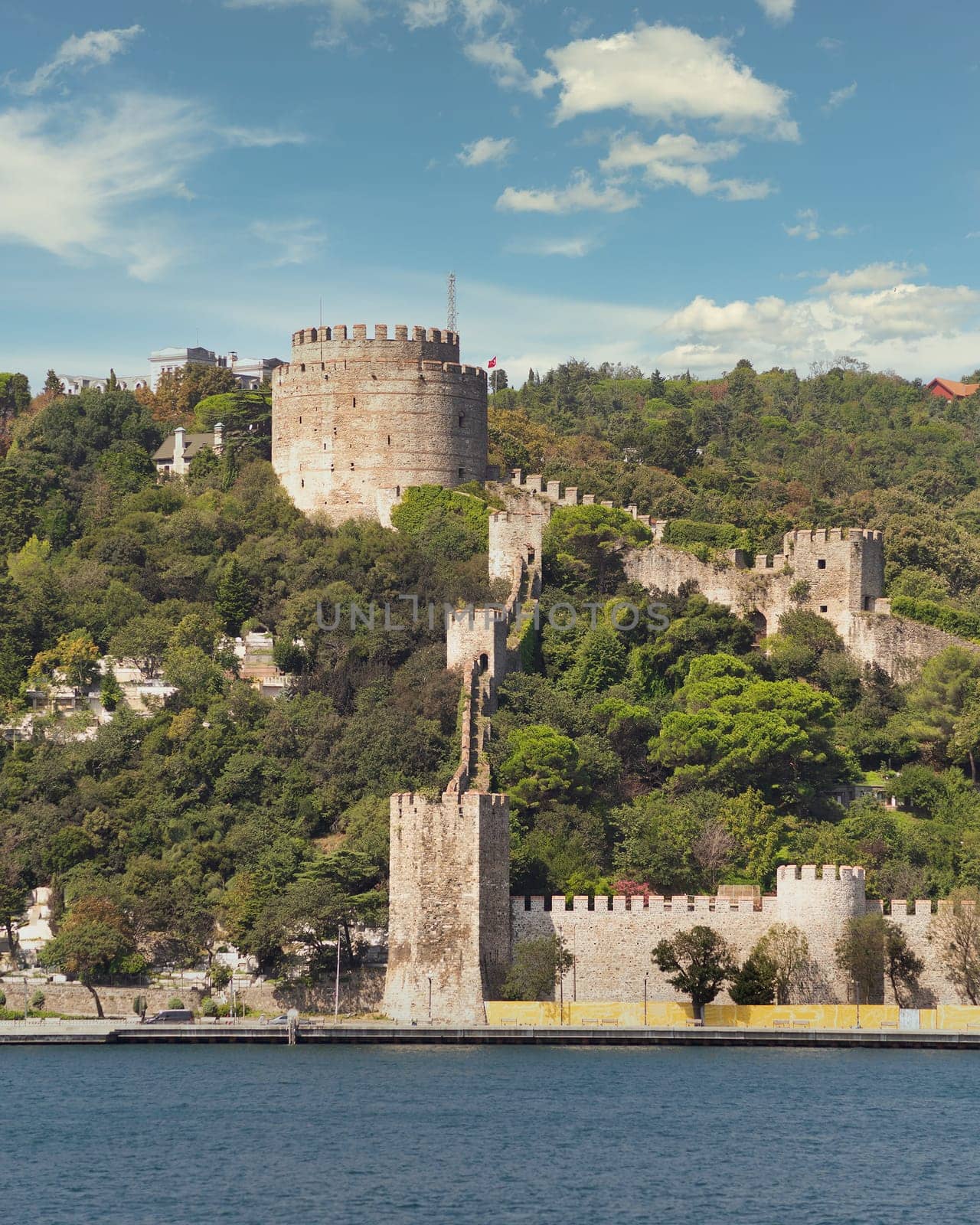 View of ruins of Rumelihisari, Bogazkesen Castle, or Rumelian Castle, in a sunny day, located at the hills of the European side of Bosphorus Strait, Istanbul, Turkey, built by Ottoman Sultan Mehmet II