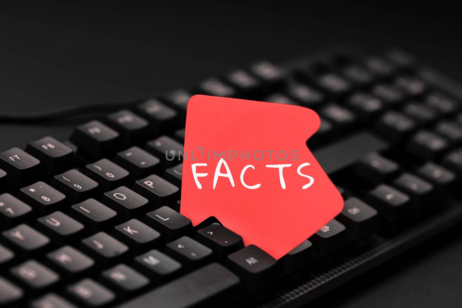 Hand writing sign Facts, Business idea information used as evidence or part of report news article blog
