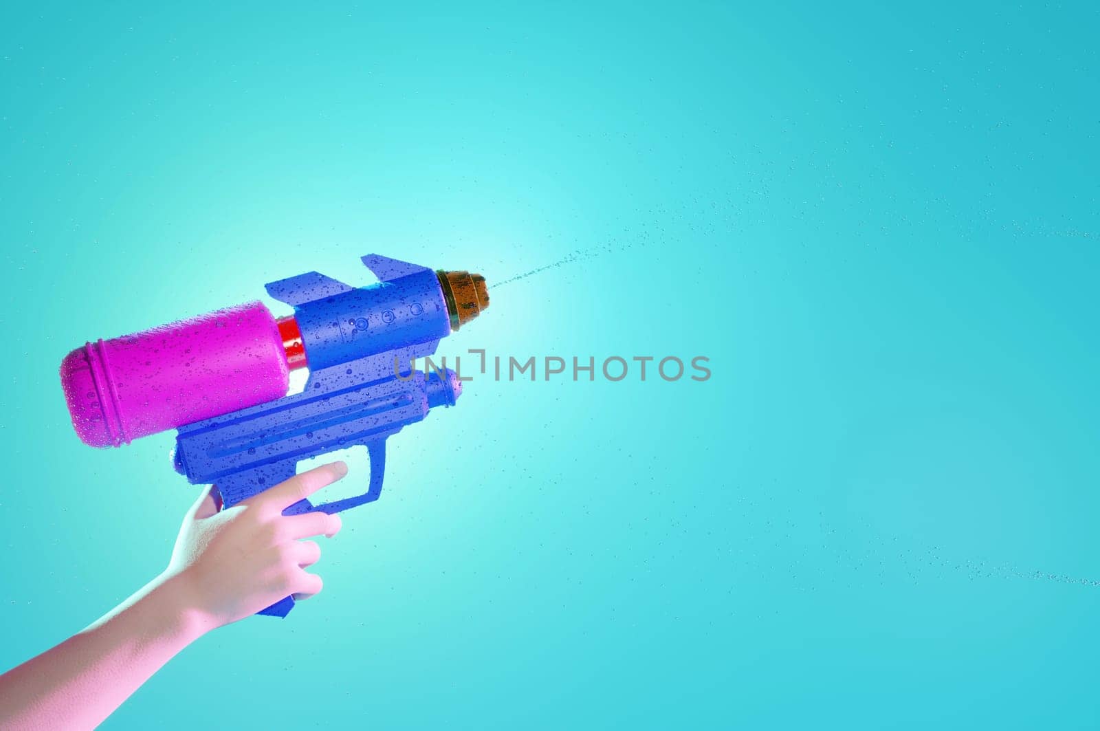 Songkran festival thailand, water gun in hands . space for text