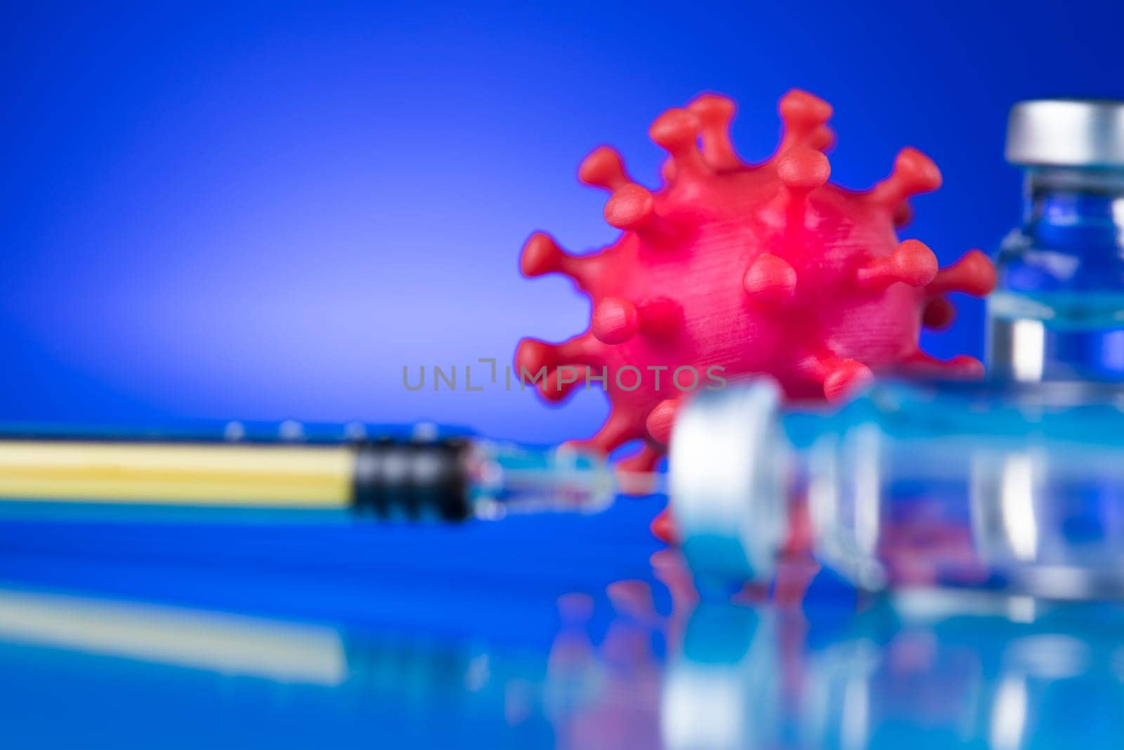 Close up medical syringe with a vaccine