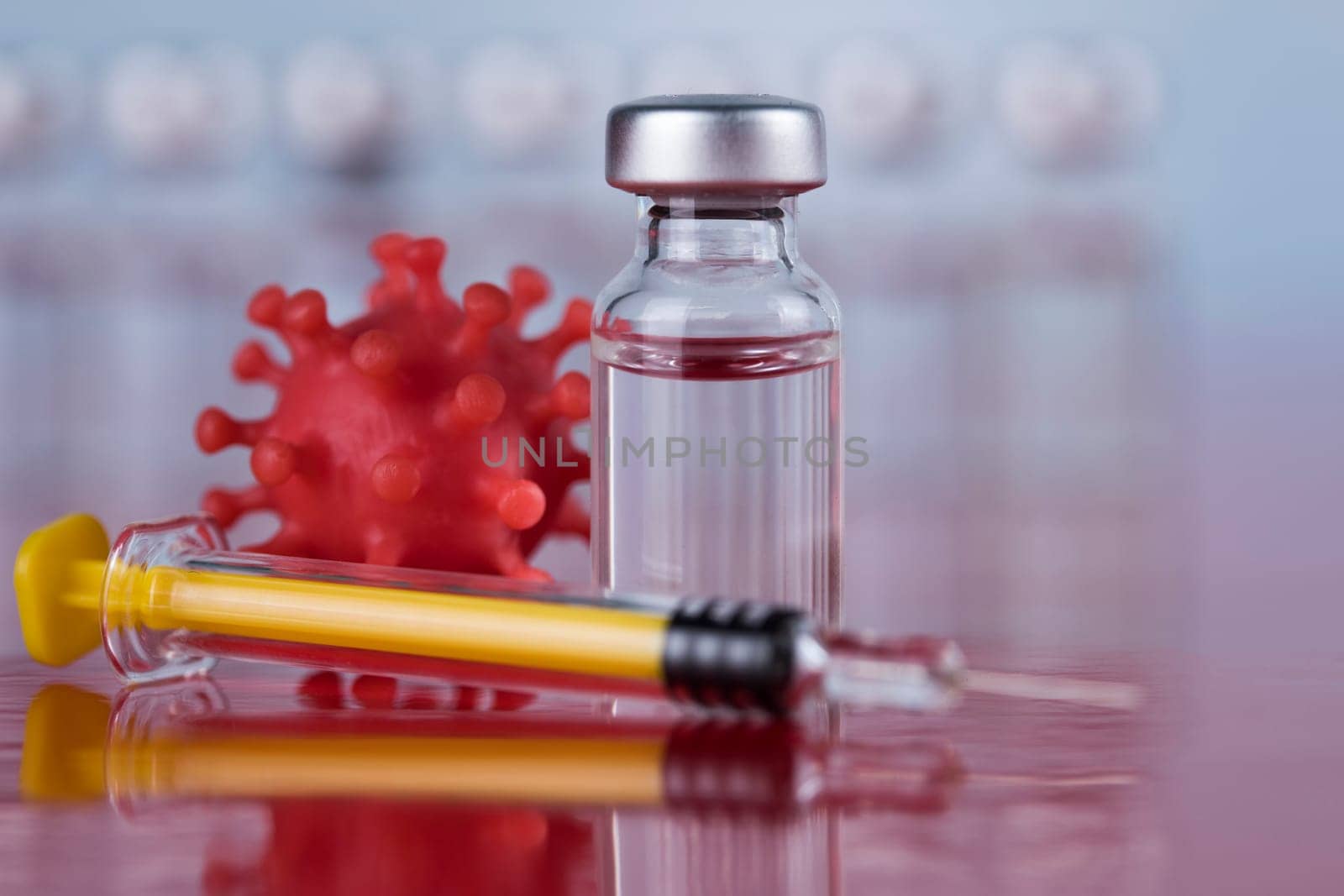 Close up medical syringe with a vaccine