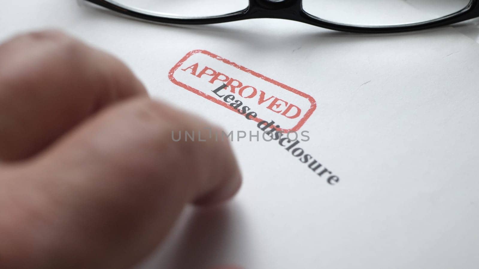 Finger tapping on lease disclosure form