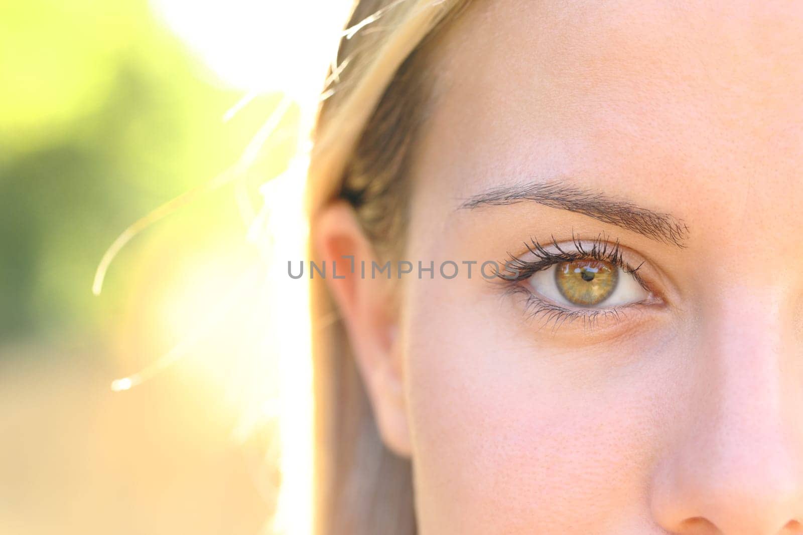 Close up of a beautiful woman eye looking at camera