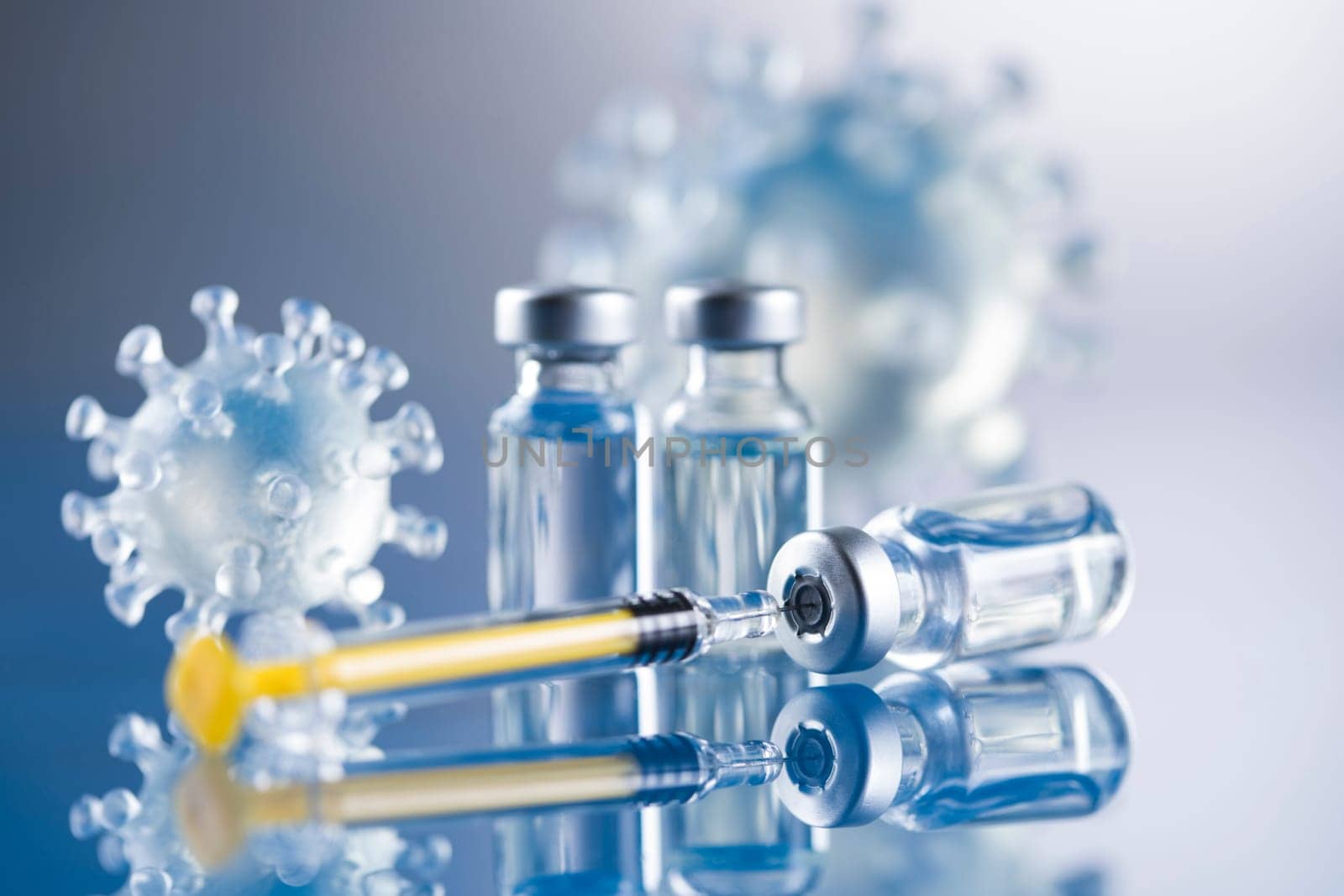 Close up medical syringe with a vaccine