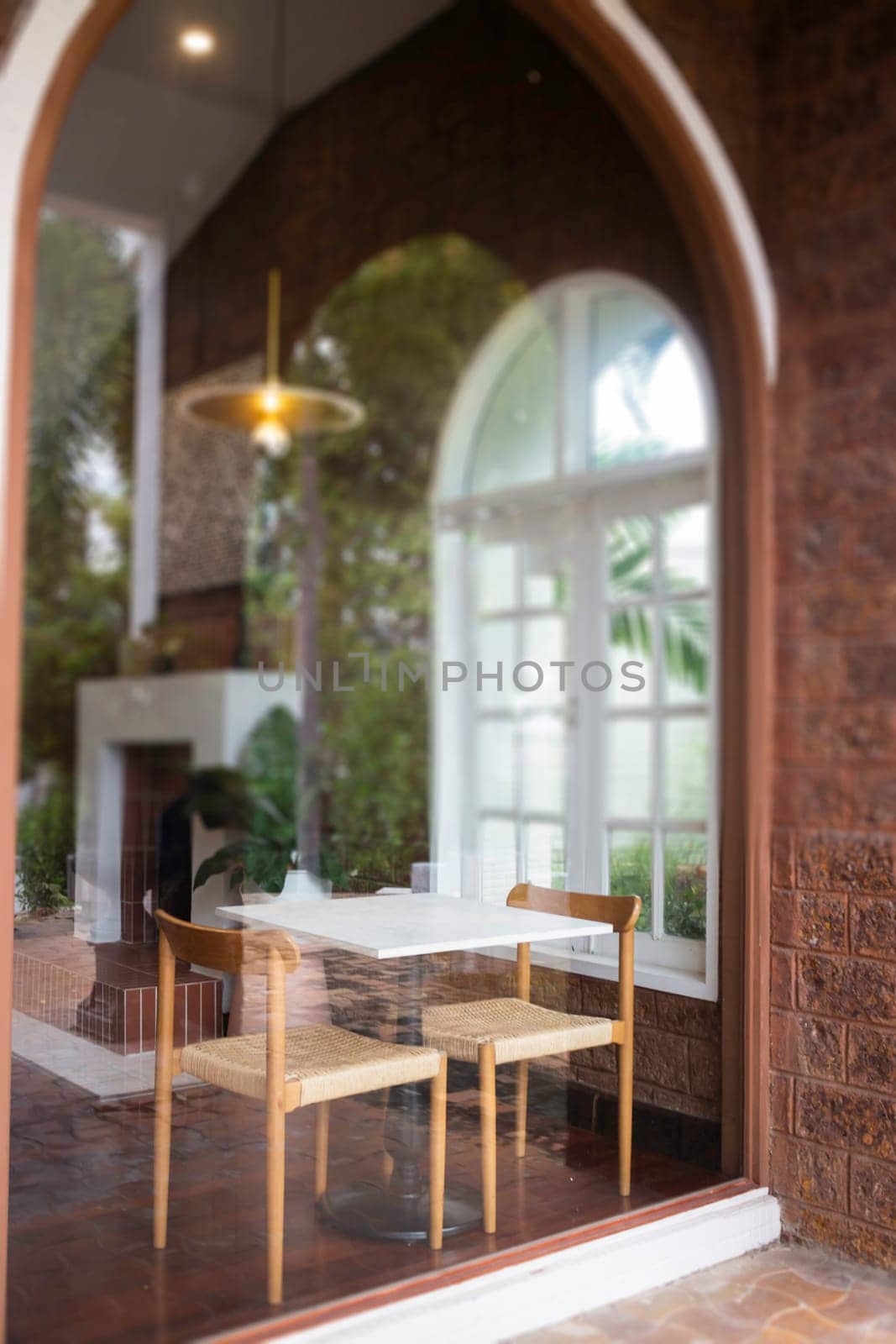 Room interior coffee shop with comfortable furniture, stock photo