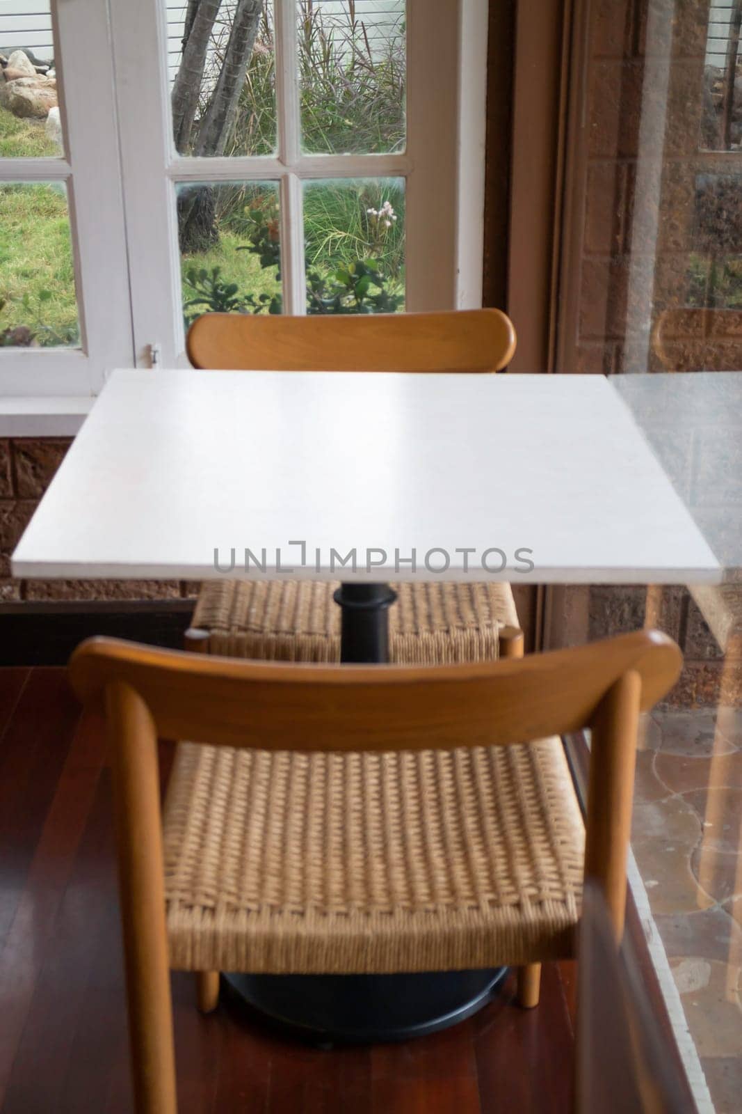 Room interior coffee shop with comfortable furniture, stock photo